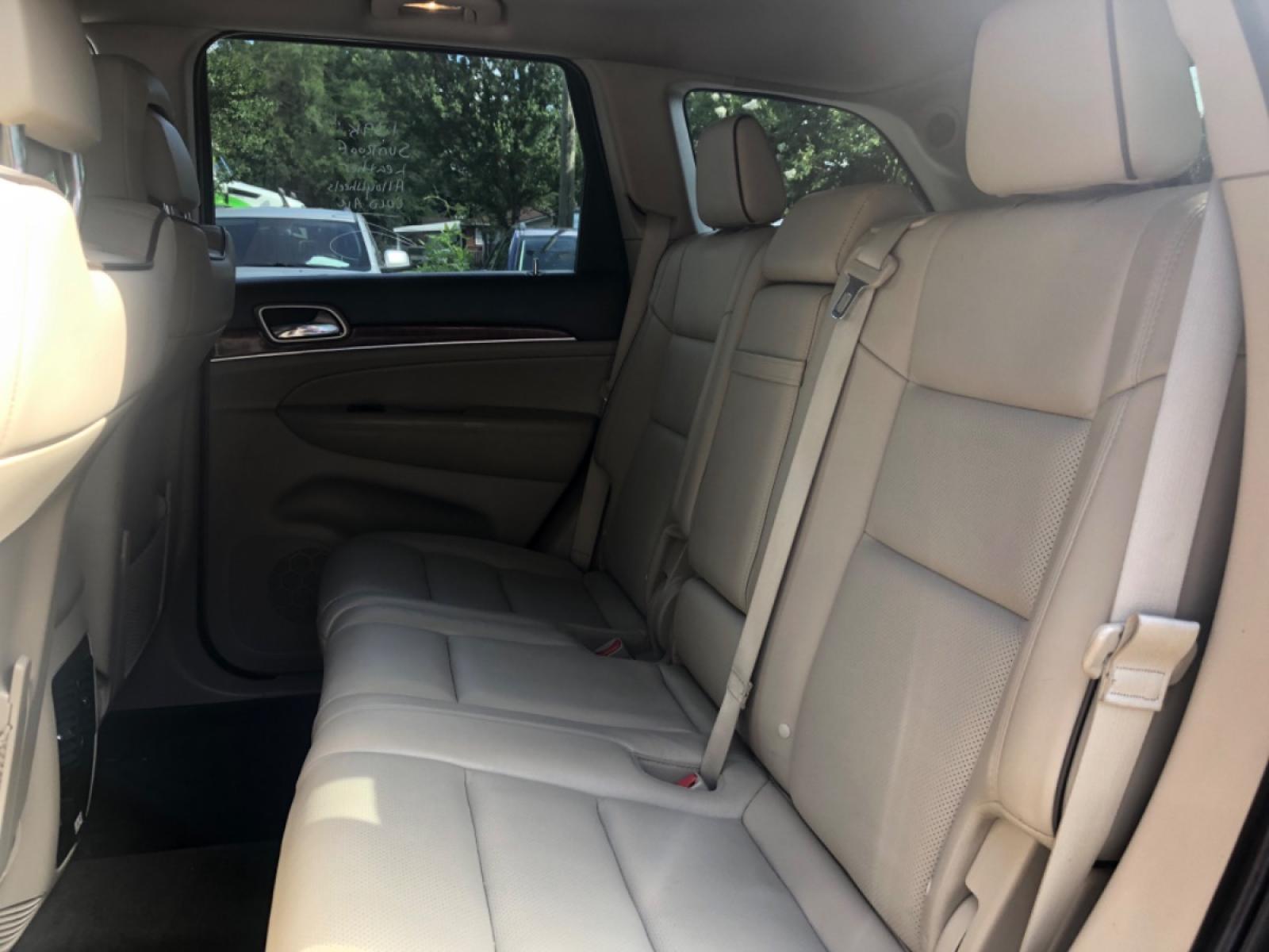 2012 BURGUN JEEP GRAND CHEROKEE OVERLAND (1C4RJFCG9CC) with an 3.6L engine, Automatic transmission, located at 5103 Dorchester Rd., Charleston, SC, 29418-5607, (843) 767-1122, 36.245171, -115.228050 - Clean Interior Fully Equipped with Leather, Panoramic Sunroof, Navigation, Backup Camera, AUX/Sat/Bluetooth, Dual Climate Control, Power Everything (windows, locks, seats, mirrors) Heated/Cooled/Memory Seats, Heated Steering Wheel, Keyless Entry, Alloy Wheels, Tow Package. 139k miles Located at N - Photo #14