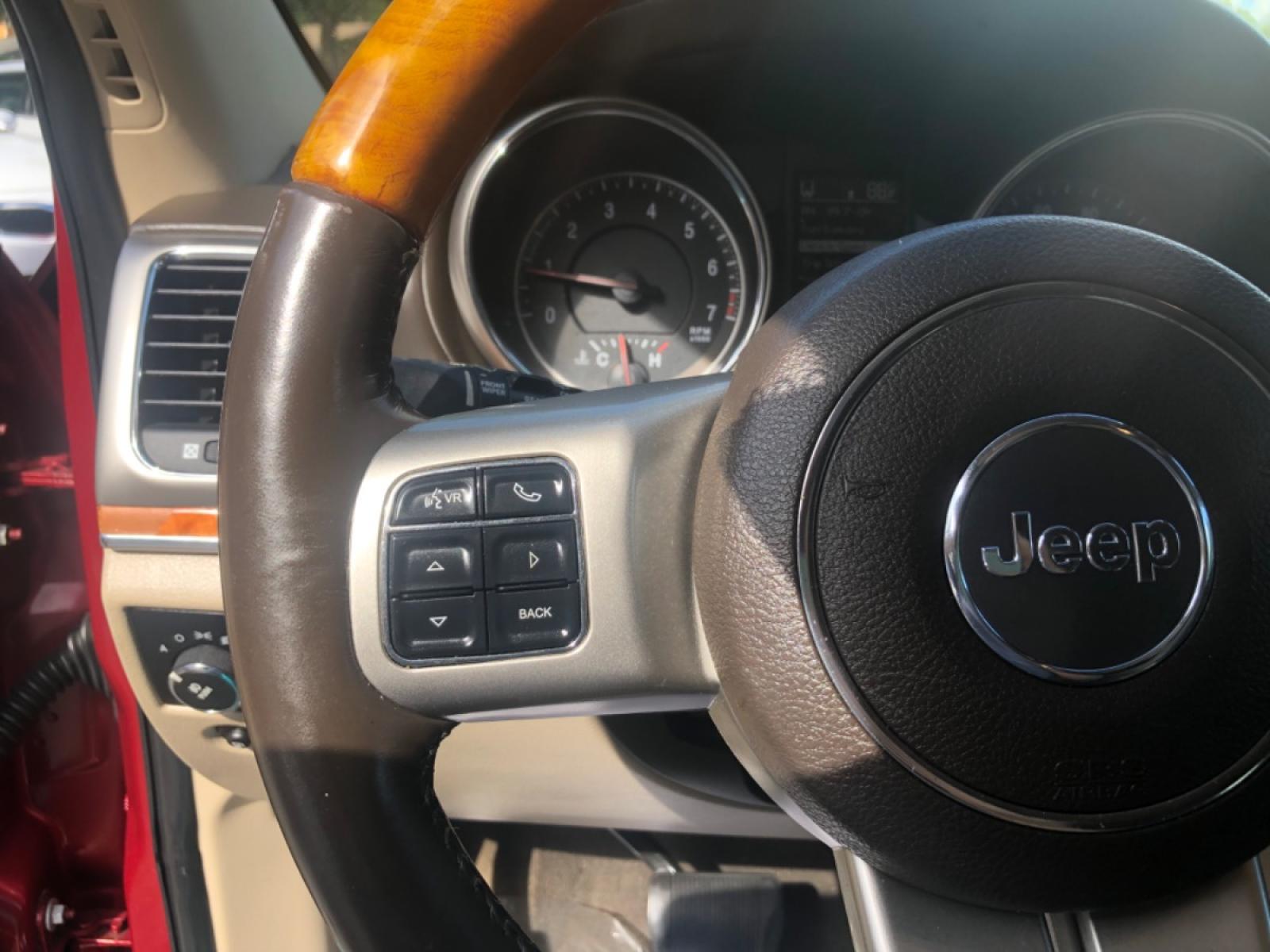 2012 BURGUN JEEP GRAND CHEROKEE OVERLAND (1C4RJFCG9CC) with an 3.6L engine, Automatic transmission, located at 5103 Dorchester Rd., Charleston, SC, 29418-5607, (843) 767-1122, 36.245171, -115.228050 - Clean Interior Fully Equipped with Leather, Panoramic Sunroof, Navigation, Backup Camera, AUX/Sat/Bluetooth, Dual Climate Control, Power Everything (windows, locks, seats, mirrors) Heated/Cooled/Memory Seats, Heated Steering Wheel, Keyless Entry, Alloy Wheels, Tow Package. 139k miles Located at N - Photo #18
