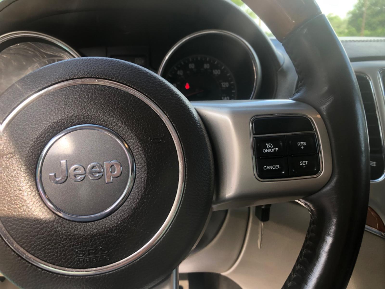 2012 BURGUN JEEP GRAND CHEROKEE OVERLAND (1C4RJFCG9CC) with an 3.6L engine, Automatic transmission, located at 5103 Dorchester Rd., Charleston, SC, 29418-5607, (843) 767-1122, 36.245171, -115.228050 - Clean Interior Fully Equipped with Leather, Panoramic Sunroof, Navigation, Backup Camera, AUX/Sat/Bluetooth, Dual Climate Control, Power Everything (windows, locks, seats, mirrors) Heated/Cooled/Memory Seats, Heated Steering Wheel, Keyless Entry, Alloy Wheels, Tow Package. 139k miles Located at N - Photo #25