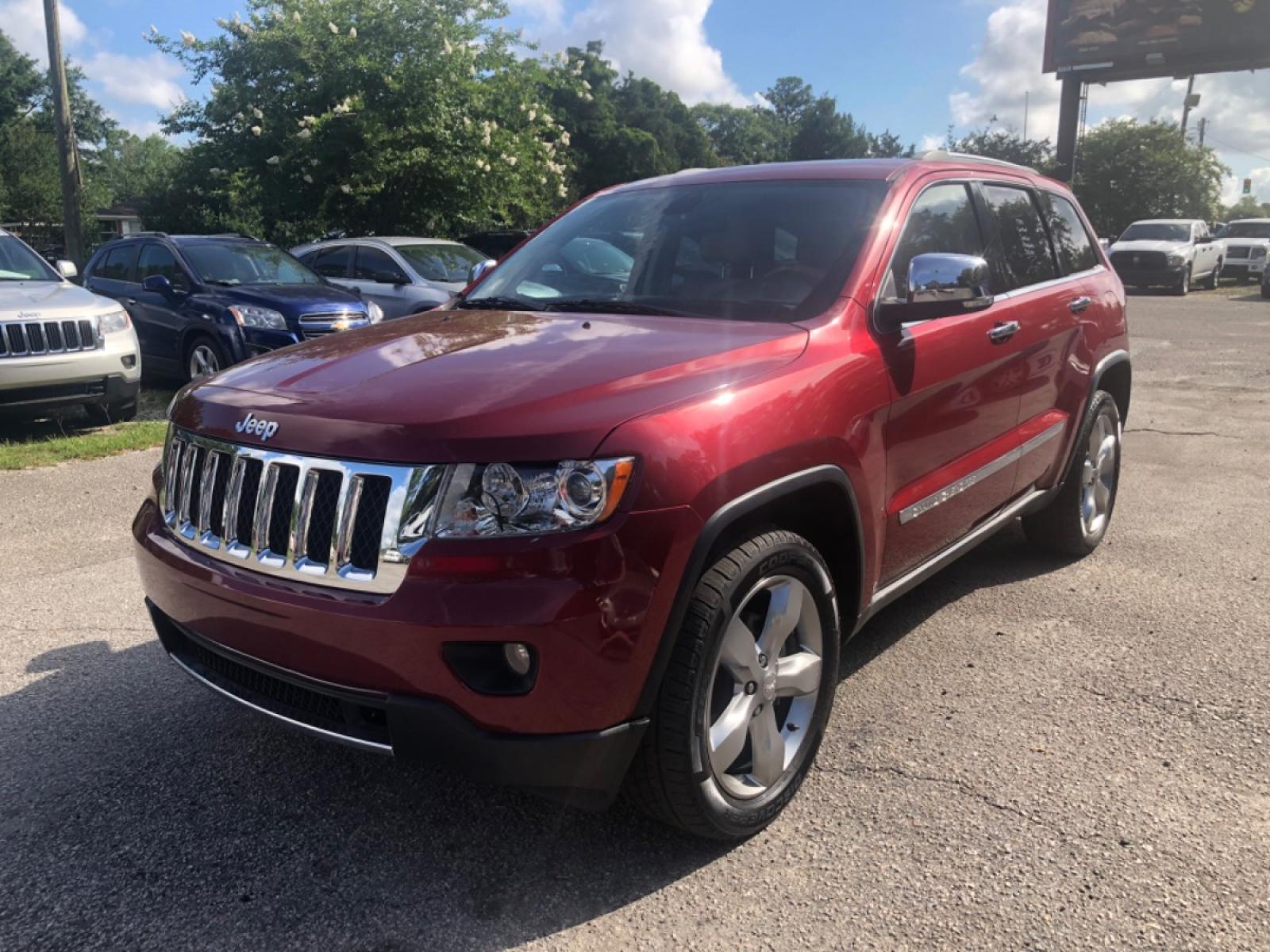 2012 BURGUN JEEP GRAND CHEROKEE OVERLAND (1C4RJFCG9CC) with an 3.6L engine, Automatic transmission, located at 5103 Dorchester Rd., Charleston, SC, 29418-5607, (843) 767-1122, 36.245171, -115.228050 - Clean Interior Fully Equipped with Leather, Panoramic Sunroof, Navigation, Backup Camera, AUX/Sat/Bluetooth, Dual Climate Control, Power Everything (windows, locks, seats, mirrors) Heated/Cooled/Memory Seats, Heated Steering Wheel, Keyless Entry, Alloy Wheels, Tow Package. 139k miles Located at N - Photo #2