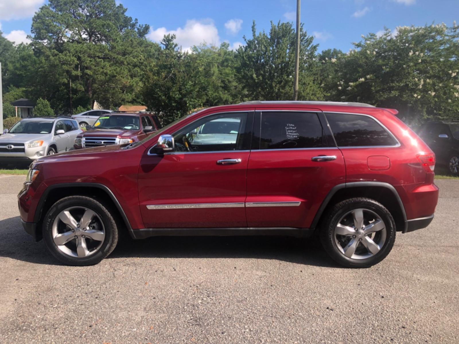 2012 BURGUN JEEP GRAND CHEROKEE OVERLAND (1C4RJFCG9CC) with an 3.6L engine, Automatic transmission, located at 5103 Dorchester Rd., Charleston, SC, 29418-5607, (843) 767-1122, 36.245171, -115.228050 - Clean Interior Fully Equipped with Leather, Panoramic Sunroof, Navigation, Backup Camera, AUX/Sat/Bluetooth, Dual Climate Control, Power Everything (windows, locks, seats, mirrors) Heated/Cooled/Memory Seats, Heated Steering Wheel, Keyless Entry, Alloy Wheels, Tow Package. 139k miles Located at N - Photo #3