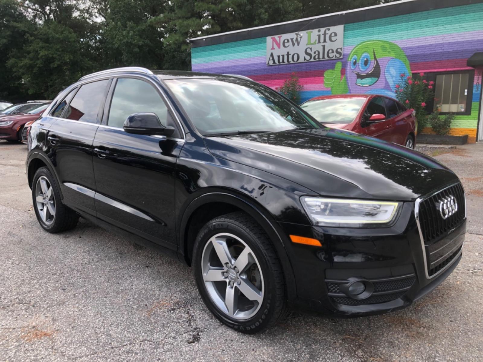 2015 BLACK AUDI Q3 PREMIUM PLUS (WA1EFCFS2FR) with an 2.0L engine, Automatic transmission, located at 5103 Dorchester Rd., Charleston, SC, 29418-5607, (843) 767-1122, 36.245171, -115.228050 - Beautiful interior with Leather, Panoramic Sunroof, CD/AUX/Bluetooth, Navigation, Dual Climate Control, Power Everything (windows, locks, seats, mirrors), Power Liftgate, Heated Seats, Keyless Entry, Push Button Start, Alloy Wheels. Only 103k miles!! Located at New Life Auto Sales! 2018-2023 Top - Photo #0