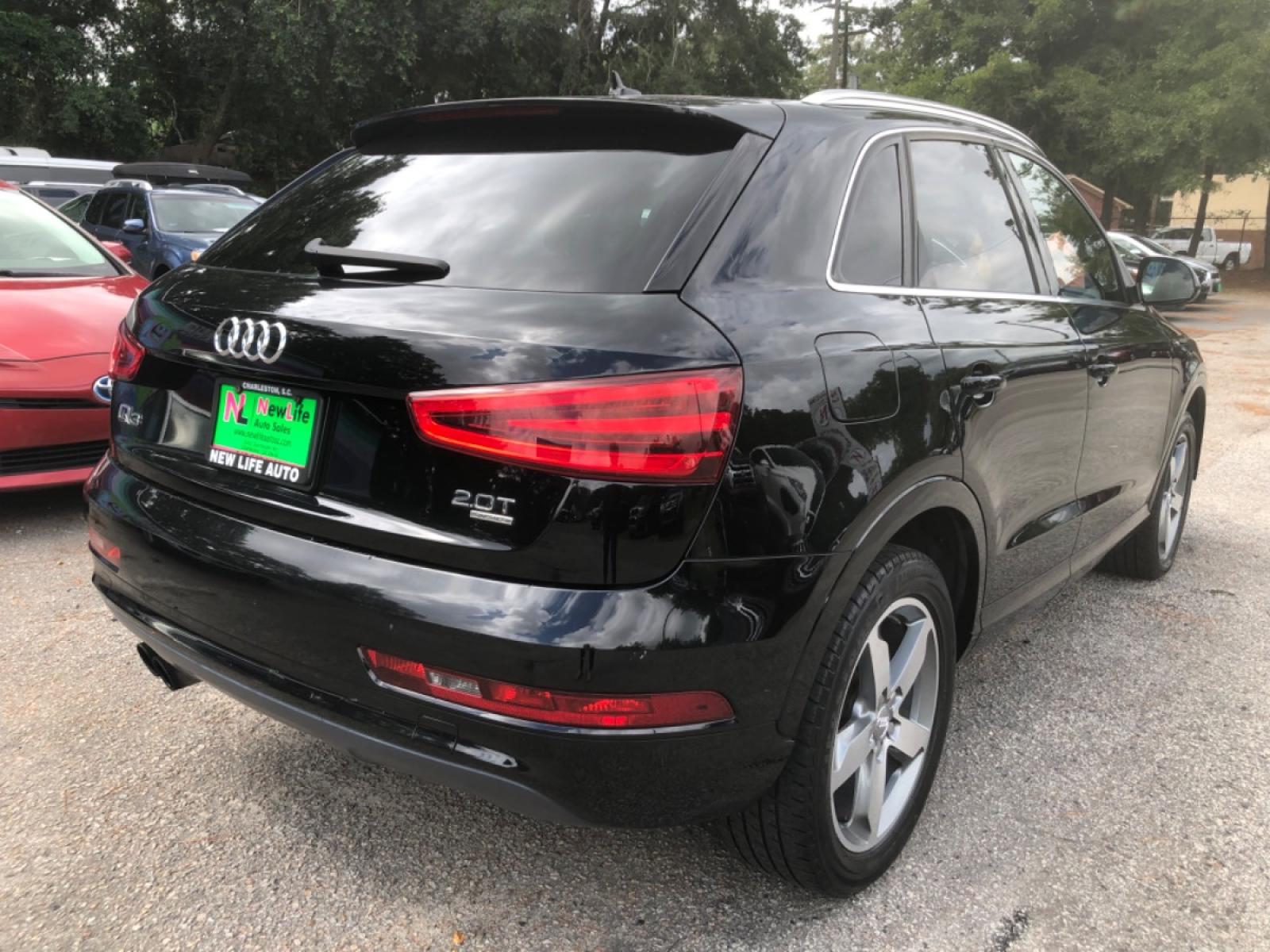2015 BLACK AUDI Q3 PREMIUM PLUS (WA1EFCFS2FR) with an 2.0L engine, Automatic transmission, located at 5103 Dorchester Rd., Charleston, SC, 29418-5607, (843) 767-1122, 36.245171, -115.228050 - Beautiful interior with Leather, Panoramic Sunroof, CD/AUX/Bluetooth, Navigation, Dual Climate Control, Power Everything (windows, locks, seats, mirrors), Power Liftgate, Heated Seats, Keyless Entry, Push Button Start, Alloy Wheels. Only 103k miles!! Located at New Life Auto Sales! 2018-2023 Top - Photo #6