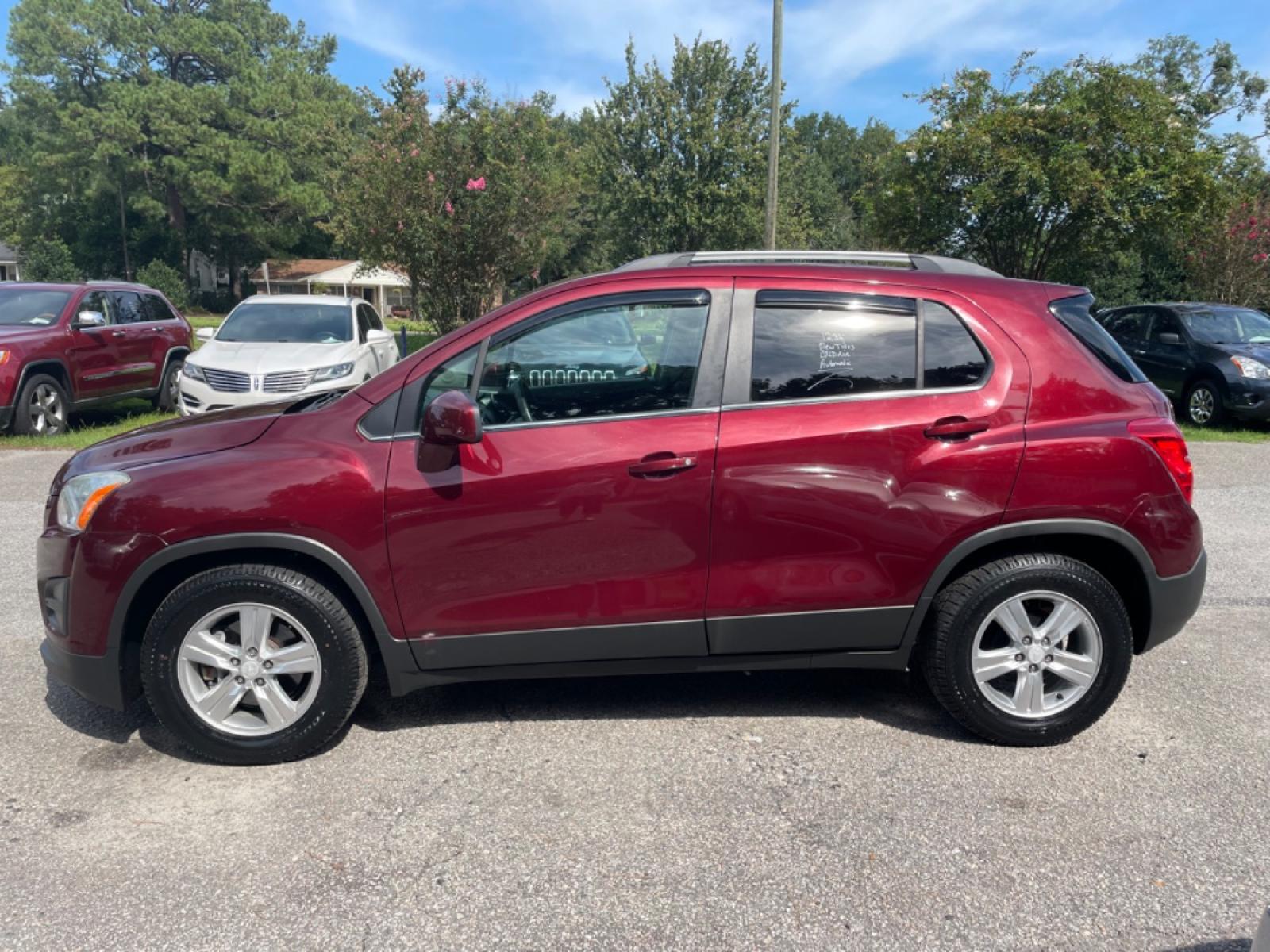 2016 RED CHEVROLET TRAX 1LT (3GNCJLSB5GL) with an 1.4L engine, Automatic transmission, located at 5103 Dorchester Rd., Charleston, SC, 29418-5607, (843) 767-1122, 36.245171, -115.228050 - Clean & comfortable interior equipped with AUX/USB/Bluetooth, Backup Camera, Power Windows, Power Locks, Power Mirrors, Spacious Cargo, Alloy Wheels. Clean CarFax (no accidents reported!) 123k miles Located at New Life Auto Sales! 2018-2022 Top 5 Finalist for Charleston City Paper's BEST PLACE TO - Photo #3