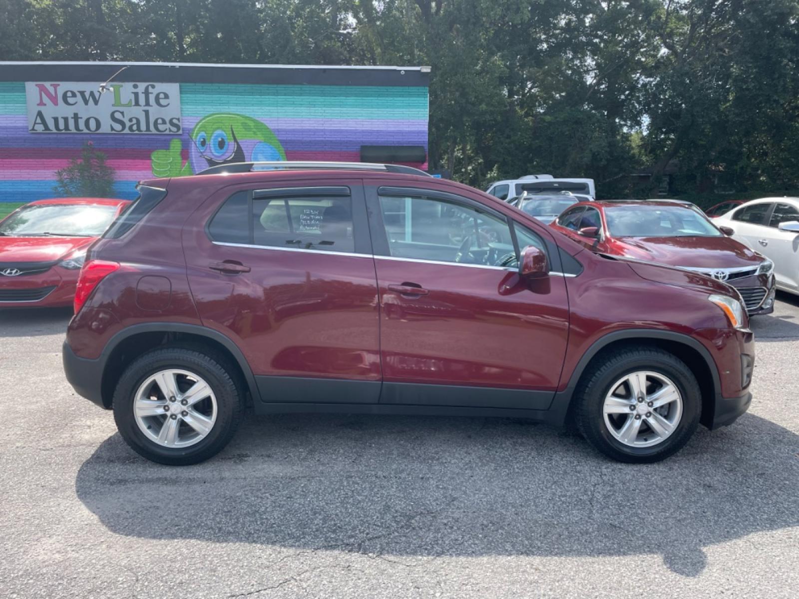 2016 RED CHEVROLET TRAX 1LT (3GNCJLSB5GL) with an 1.4L engine, Automatic transmission, located at 5103 Dorchester Rd., Charleston, SC, 29418-5607, (843) 767-1122, 36.245171, -115.228050 - Clean & comfortable interior equipped with AUX/USB/Bluetooth, Backup Camera, Power Windows, Power Locks, Power Mirrors, Spacious Cargo, Alloy Wheels. Clean CarFax (no accidents reported!) 123k miles Located at New Life Auto Sales! 2018-2022 Top 5 Finalist for Charleston City Paper's BEST PLACE TO - Photo #7