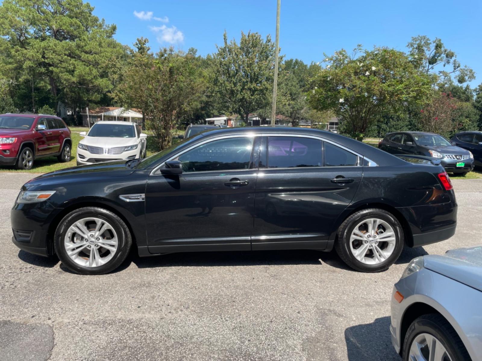 2014 BLACK FORD TAURUS SEL (1FAHP2E89EG) with an 3.5L engine, Automatic transmission, located at 5103 Dorchester Rd., Charleston, SC, 29418-5607, (843) 767-1122, 36.245171, -115.228050 - Photo #3