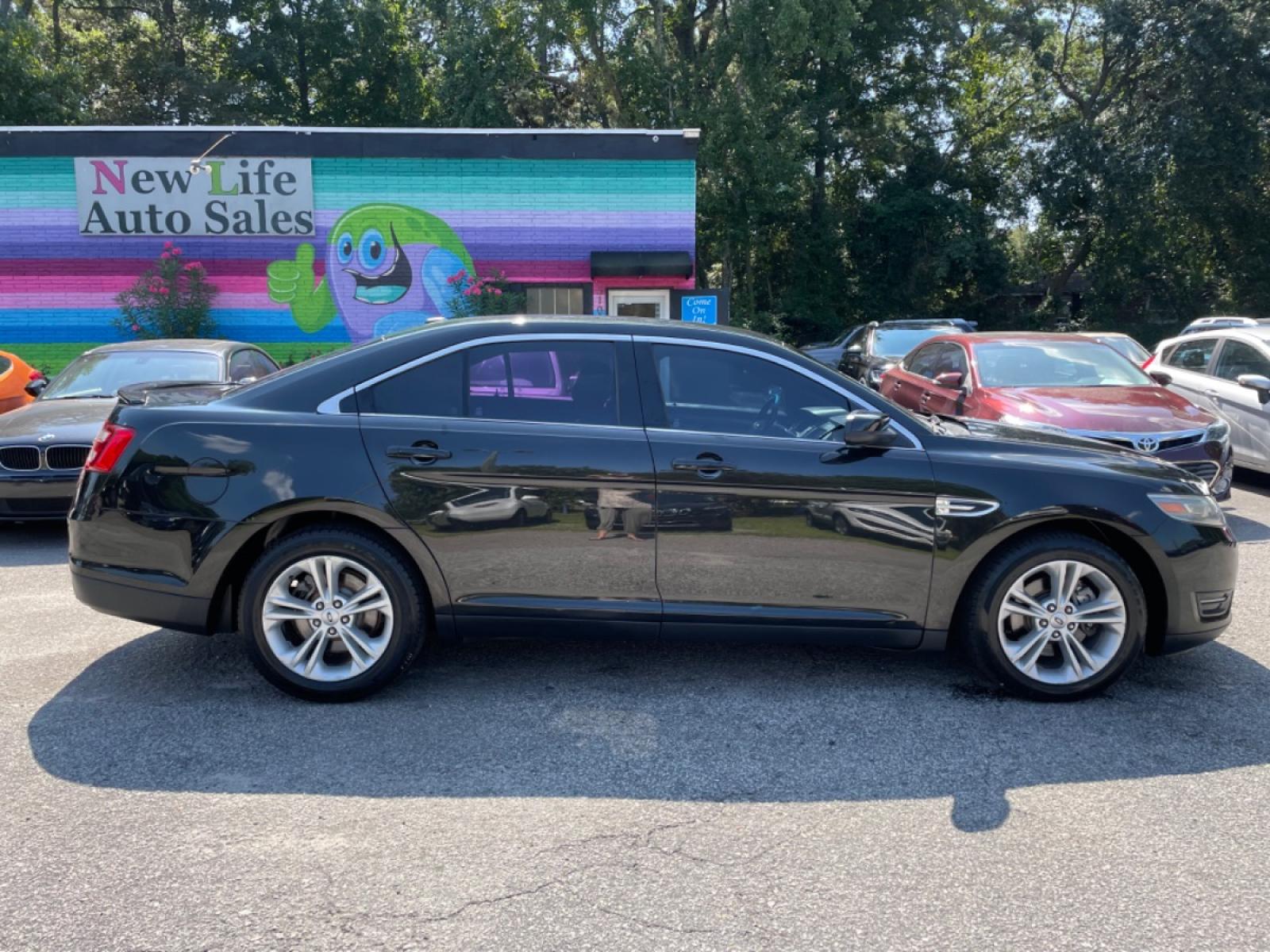 2014 BLACK FORD TAURUS SEL (1FAHP2E89EG) with an 3.5L engine, Automatic transmission, located at 5103 Dorchester Rd., Charleston, SC, 29418-5607, (843) 767-1122, 36.245171, -115.228050 - Photo #7