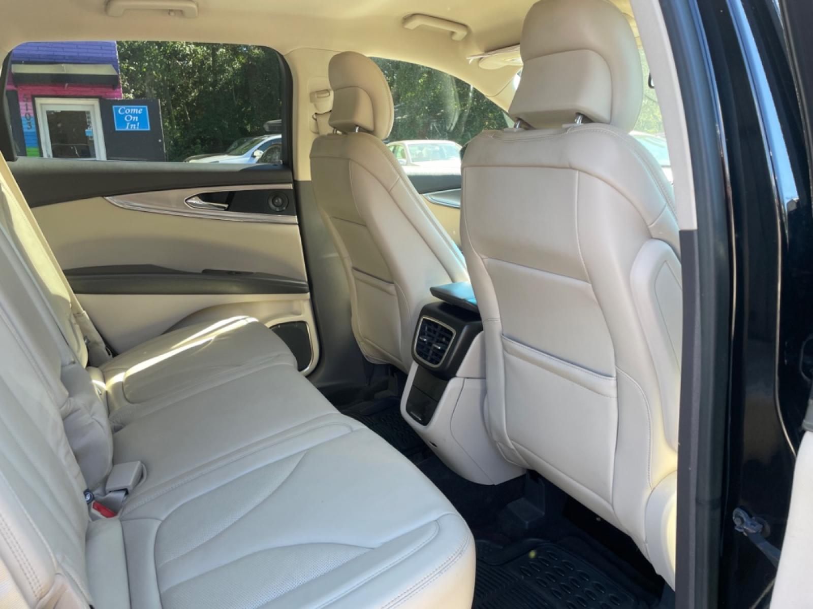 2016 BLACK LINCOLN MKX SELECT (2LMPJ8KR2GB) with an 3.7L engine, Automatic transmission, located at 5103 Dorchester Rd., Charleston, SC, 29418-5607, (843) 767-1122, 36.245171, -115.228050 - Beautiful Leather Interior with CD/AUX/Sat/Bluetooth, Backup Camera, Dual Climate Control, Power Everything (windows, locks, seats, mirrors), Power Liftgate, Memory/Heated Seats, Push Button Start, Keyless Entry, Alloy Wheels. Clean CarFax (no accidents reported!) Local Trade-in!! Only 88k miles! - Photo #11