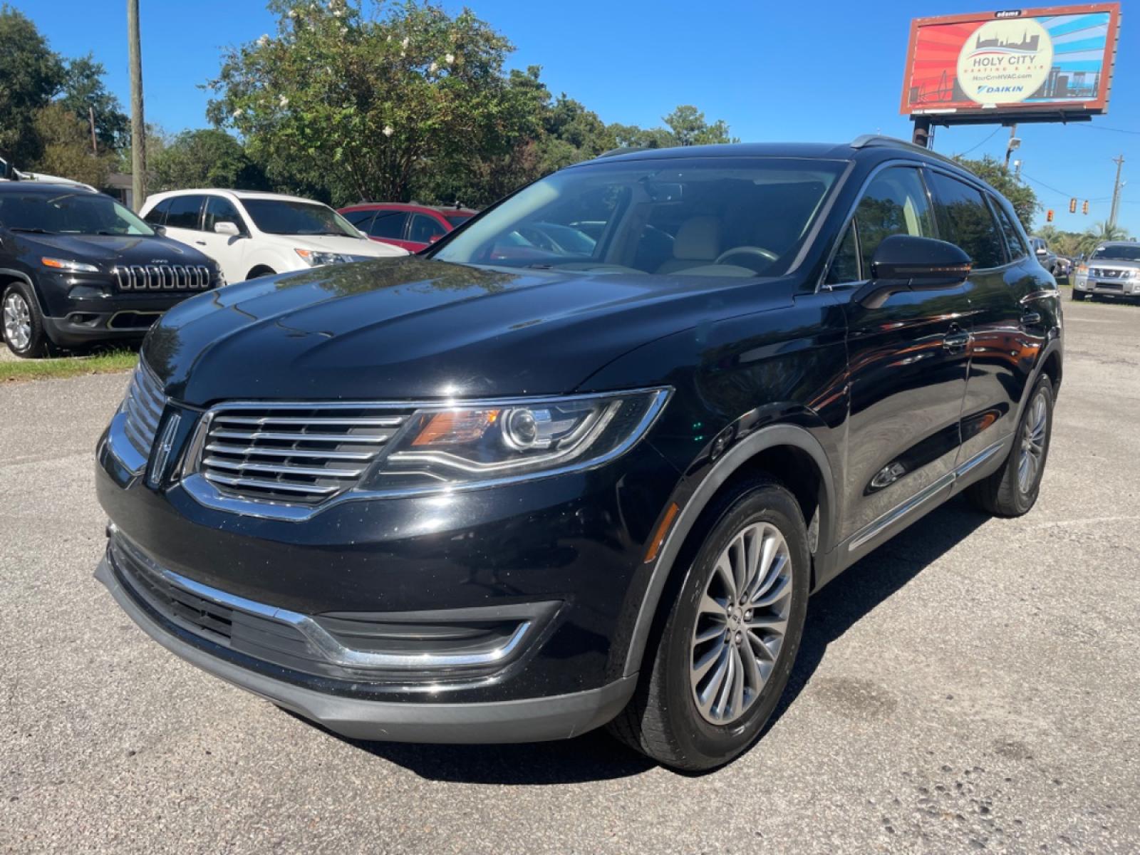 2016 BLACK LINCOLN MKX SELECT (2LMPJ8KR2GB) with an 3.7L engine, Automatic transmission, located at 5103 Dorchester Rd., Charleston, SC, 29418-5607, (843) 767-1122, 36.245171, -115.228050 - Beautiful Leather Interior with CD/AUX/Sat/Bluetooth, Backup Camera, Dual Climate Control, Power Everything (windows, locks, seats, mirrors), Power Liftgate, Memory/Heated Seats, Push Button Start, Keyless Entry, Alloy Wheels. Clean CarFax (no accidents reported!) Local Trade-in!! Only 88k miles! - Photo #2