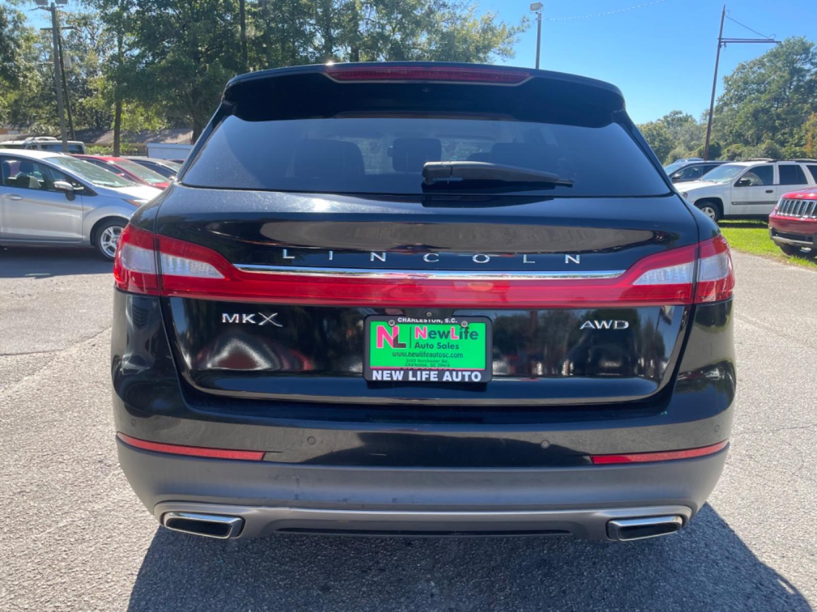 2016 BLACK LINCOLN MKX SELECT (2LMPJ8KR2GB) with an 3.7L engine, Automatic transmission, located at 5103 Dorchester Rd., Charleston, SC, 29418-5607, (843) 767-1122, 36.245171, -115.228050 - Photo #4