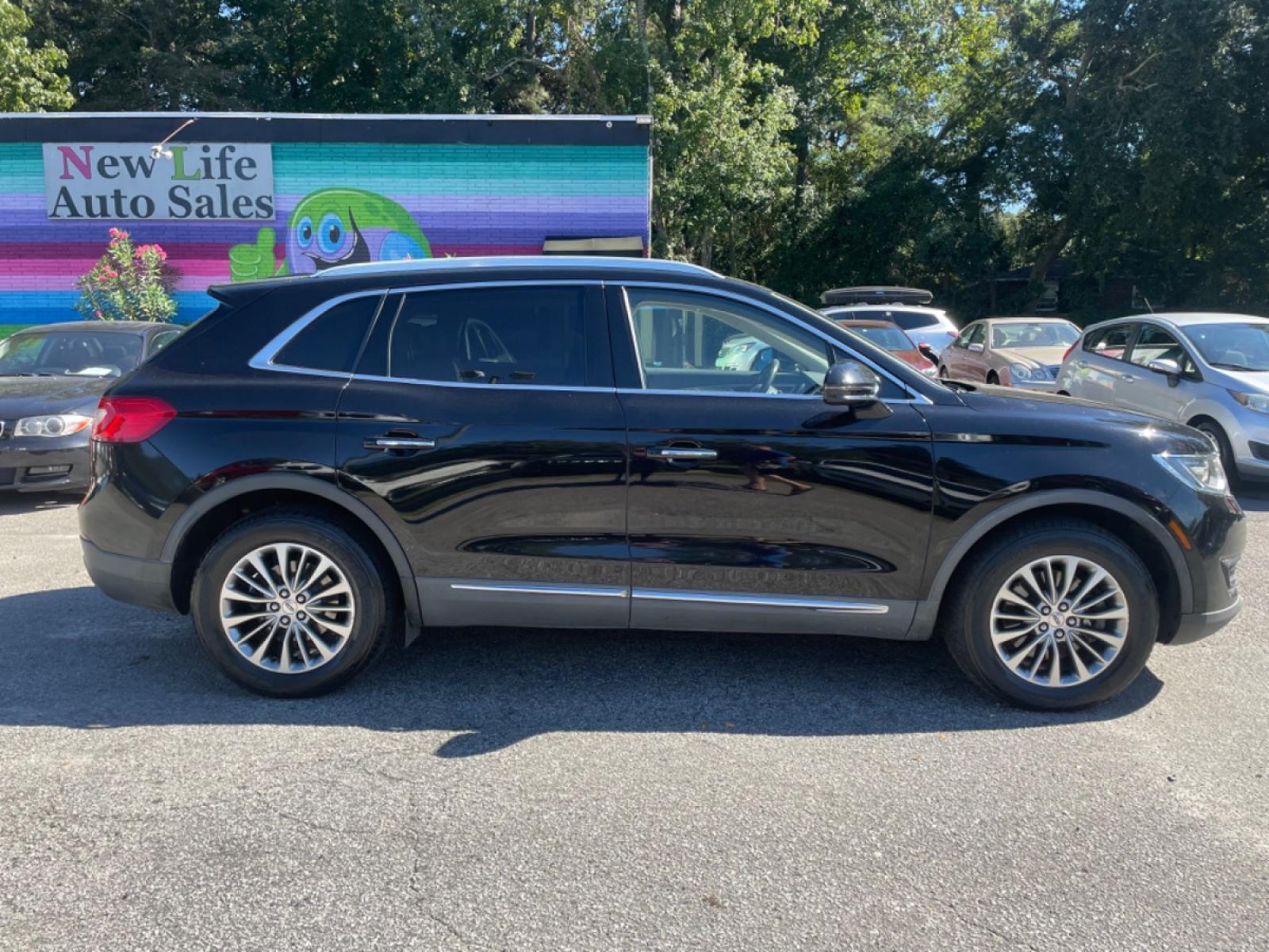 2016 BLACK LINCOLN MKX SELECT (2LMPJ8KR2GB) with an 3.7L engine, Automatic transmission, located at 5103 Dorchester Rd., Charleston, SC, 29418-5607, (843) 767-1122, 36.245171, -115.228050 - Beautiful Leather Interior with CD/AUX/Sat/Bluetooth, Backup Camera, Dual Climate Control, Power Everything (windows, locks, seats, mirrors), Power Liftgate, Memory/Heated Seats, Push Button Start, Keyless Entry, Alloy Wheels. Clean CarFax (no accidents reported!) Local Trade-in!! Only 88k miles! L - Photo #6