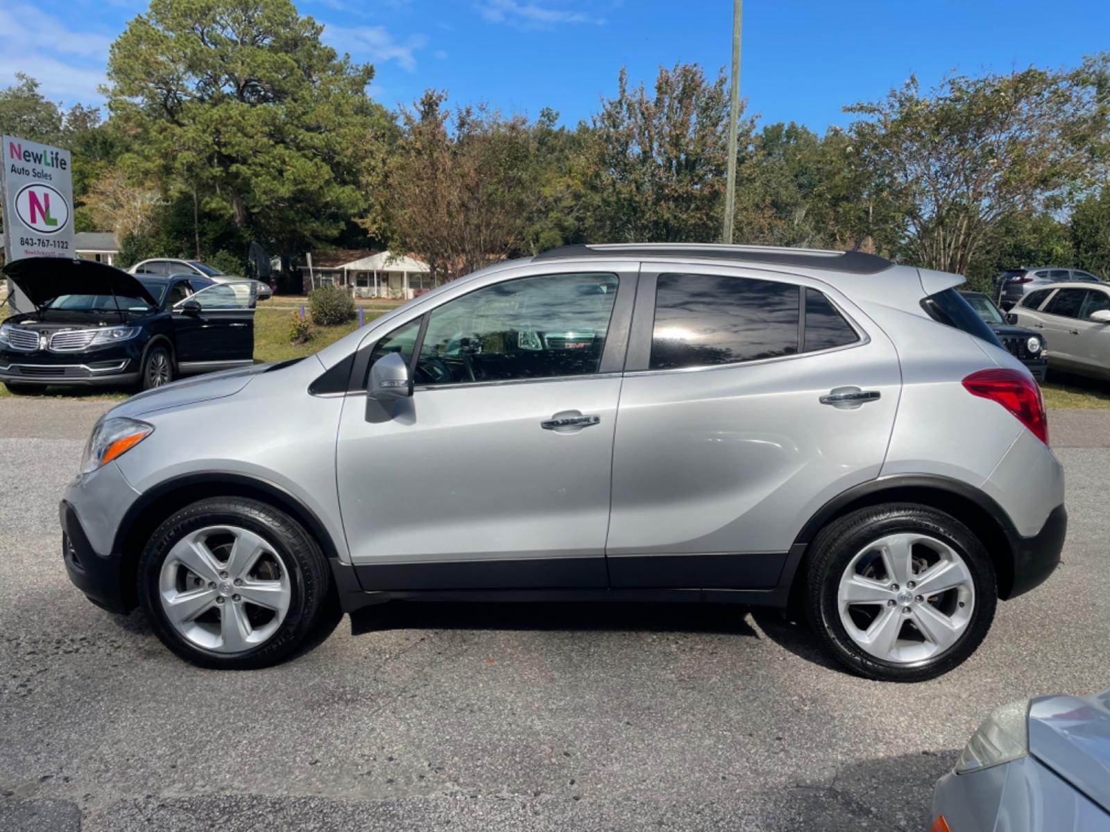 2015 SILVER BUICK ENCORE (KL4CJCSB6FB) with an 1.4L engine, Automatic transmission, located at 5103 Dorchester Rd., Charleston, SC, 29418-5607, (843) 767-1122, 36.245171, -115.228050 - Photo #2