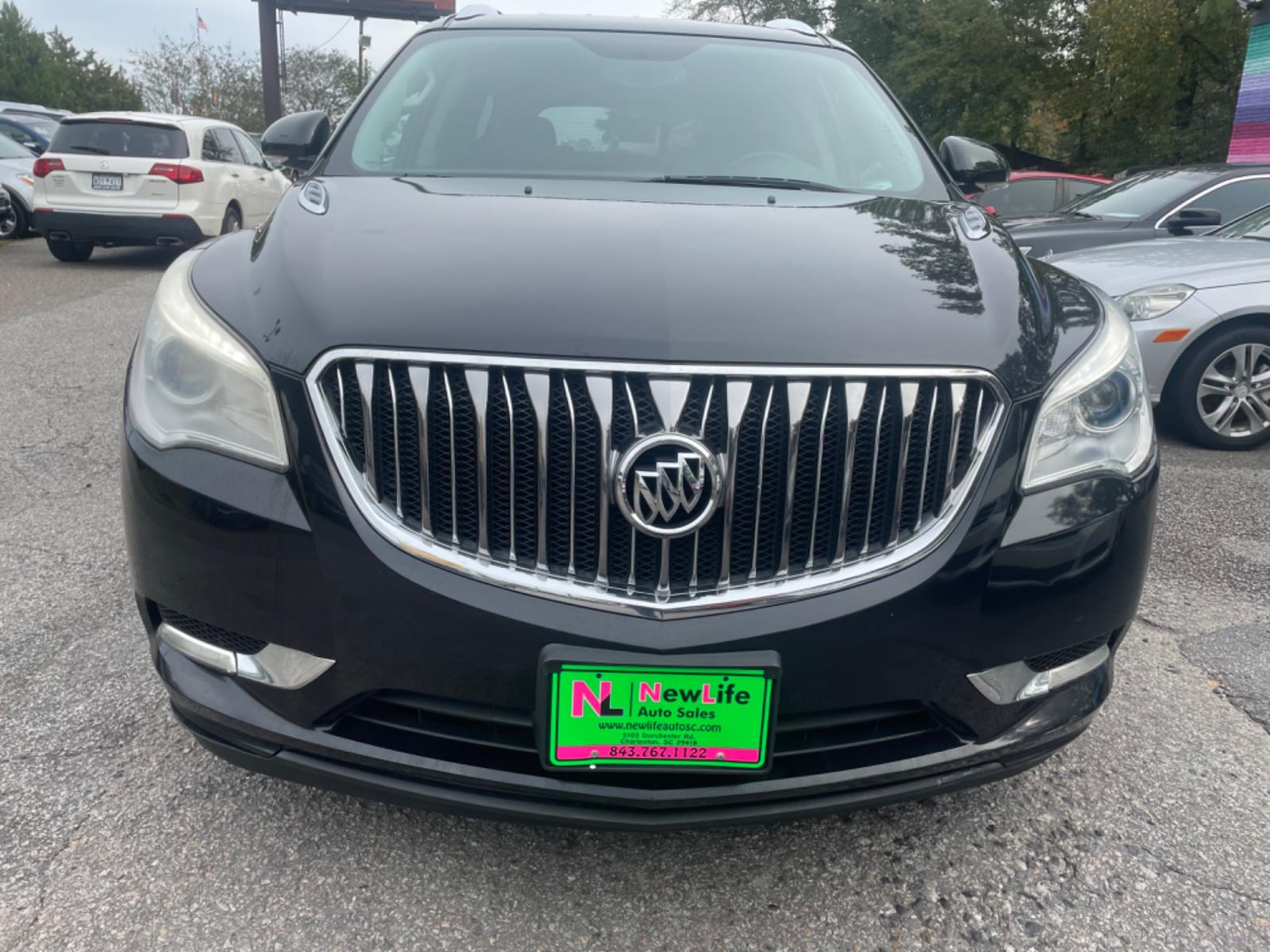 2014 BLACK BUICK ENCLAVE (5GAKRBKD4EJ) with an 3.6L engine, Automatic transmission, located at 5103 Dorchester Rd., Charleston, SC, 29418-5607, (843) 767-1122, 36.245171, -115.228050 - Leather interior with Navigation, Backup Camera, Bose Stereo with CD/AUX/Sat/Bluetooth, Dual Climate Control, Power Everything (windows, locks, seats, mirrors), Heated/Memory Seating, Rear Climate Control, Power Liftgate, 3rd Row with Middle Captains Row, Keyless Entry, Chrome Wheels. Clean CarFax ( - Photo #1