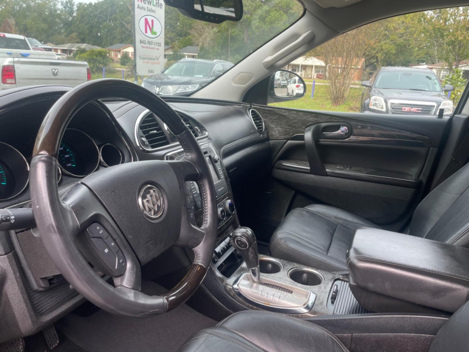 2014 BLACK BUICK ENCLAVE (5GAKRBKD4EJ) with an 3.6L engine, Automatic transmission, located at 5103 Dorchester Rd., Charleston, SC, 29418-5607, (843) 767-1122, 36.245171, -115.228050 - Leather interior with Navigation, Backup Camera, Bose Stereo with CD/AUX/Sat/Bluetooth, Dual Climate Control, Power Everything (windows, locks, seats, mirrors), Heated/Memory Seating, Rear Climate Control, Power Liftgate, 3rd Row with Middle Captains Row, Keyless Entry, Chrome Wheels. Clean CarFax ( - Photo #21