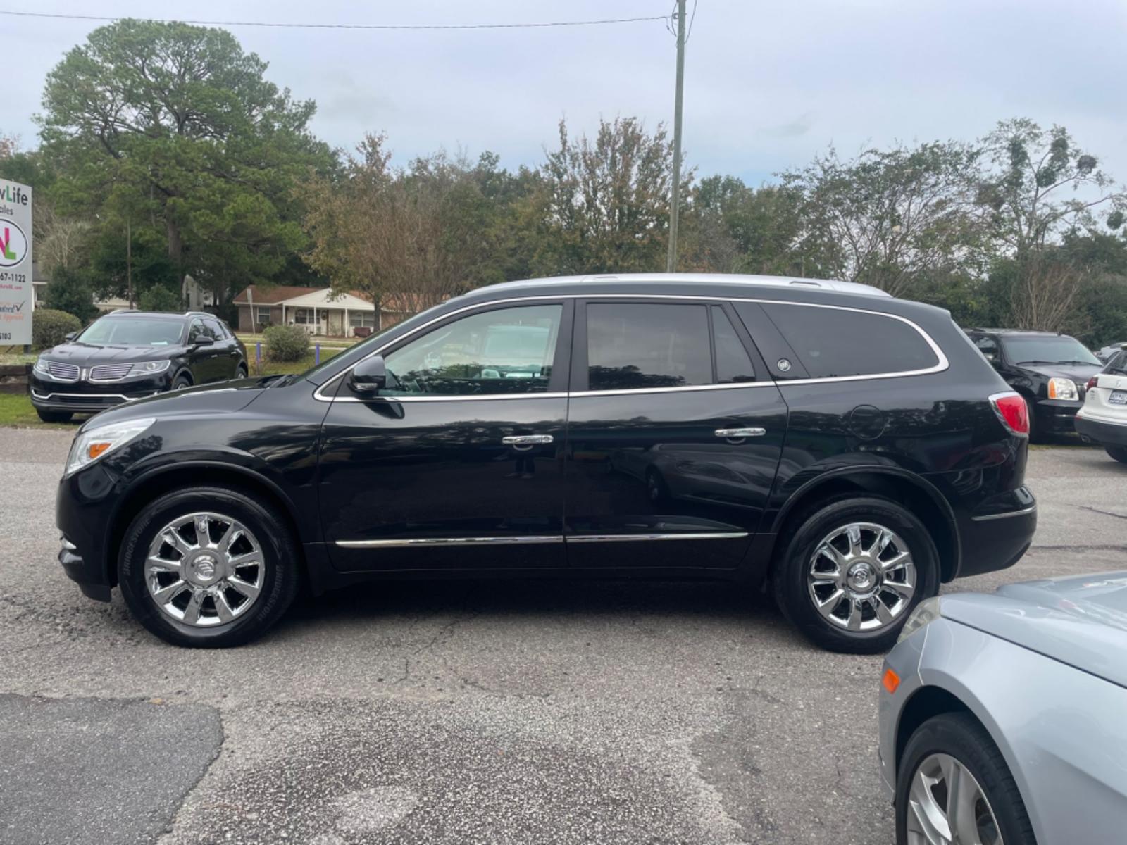 2014 BLACK BUICK ENCLAVE (5GAKRBKD4EJ) with an 3.6L engine, Automatic transmission, located at 5103 Dorchester Rd., Charleston, SC, 29418-5607, (843) 767-1122, 36.245171, -115.228050 - Leather interior with Navigation, Backup Camera, Bose Stereo with CD/AUX/Sat/Bluetooth, Dual Climate Control, Power Everything (windows, locks, seats, mirrors), Heated/Memory Seating, Rear Climate Control, Power Liftgate, 3rd Row with Middle Captains Row, Keyless Entry, Chrome Wheels. Clean CarFax ( - Photo #3