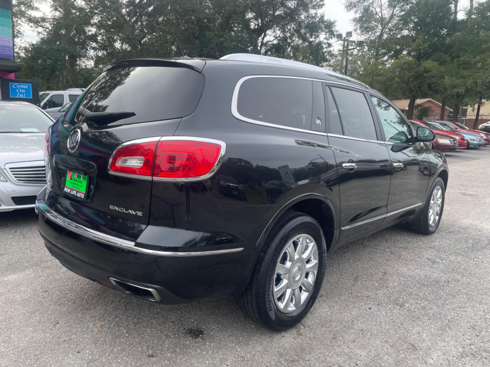 2014 BLACK BUICK ENCLAVE (5GAKRBKD4EJ) with an 3.6L engine, Automatic transmission, located at 5103 Dorchester Rd., Charleston, SC, 29418-5607, (843) 767-1122, 36.245171, -115.228050 - Leather interior with Navigation, Backup Camera, Bose Stereo with CD/AUX/Sat/Bluetooth, Dual Climate Control, Power Everything (windows, locks, seats, mirrors), Heated/Memory Seating, Rear Climate Control, Power Liftgate, 3rd Row with Middle Captains Row, Keyless Entry, Chrome Wheels. Clean CarFax ( - Photo #6