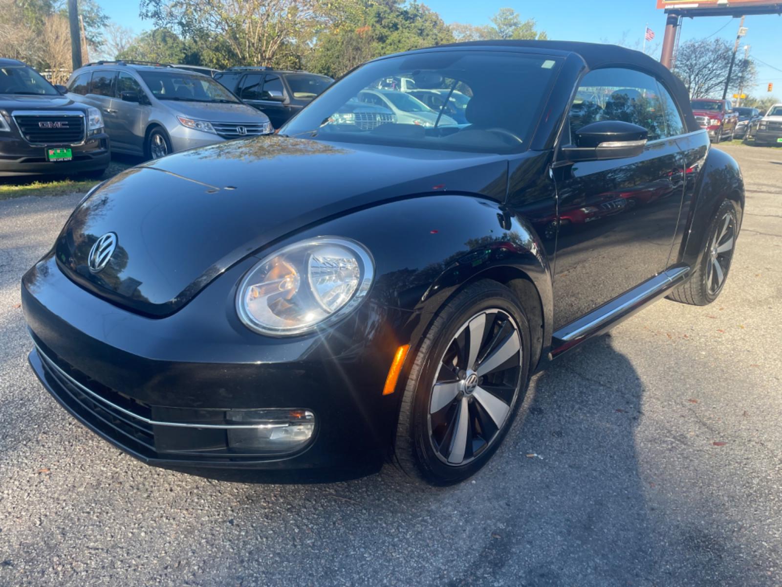 2013 BLACK VOLKSWAGEN BEETLE TURBO (3VW7A7AT2DM) with an 2.0L engine, Automatic transmission, located at 5103 Dorchester Rd., Charleston, SC, 29418-5607, (843) 767-1122, 36.245171, -115.228050 - Leather, Convertible Top, CD/AUX/Bluetooth, Heated Seats, Power Windows, Power Locks, Power Mirrors, All-weather mats, Keyless Entry, Alloy Wheels. Clean CarFax (no accidents reported!) Local Trade-in!! 117k miles Located at New Life Auto Sales! 2018-2022 Top 5 Finalist for Charleston City Paper' - Photo #2