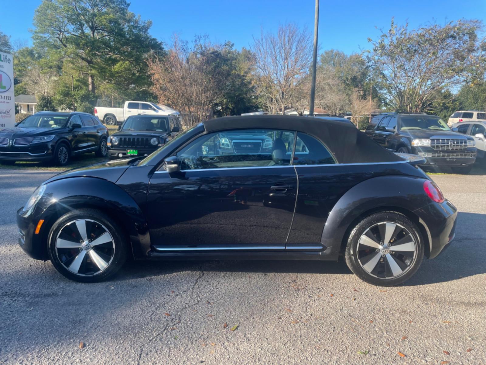 2013 BLACK VOLKSWAGEN BEETLE TURBO (3VW7A7AT2DM) with an 2.0L engine, Automatic transmission, located at 5103 Dorchester Rd., Charleston, SC, 29418-5607, (843) 767-1122, 36.245171, -115.228050 - Leather, Convertible Top, CD/AUX/Bluetooth, Heated Seats, Power Windows, Power Locks, Power Mirrors, All-weather mats, Keyless Entry, Alloy Wheels. Clean CarFax (no accidents reported!) Local Trade-in!! 117k miles Located at New Life Auto Sales! 2018-2022 Top 5 Finalist for Charleston City Paper' - Photo #3