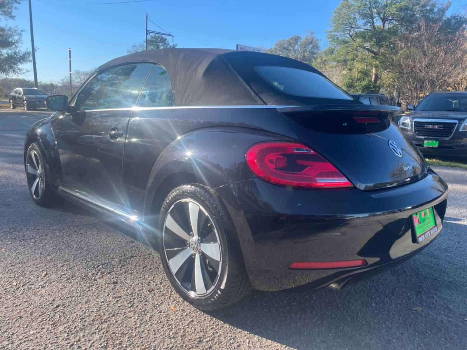 2013 BLACK VOLKSWAGEN BEETLE TURBO (3VW7A7AT2DM) with an 2.0L engine, Automatic transmission, located at 5103 Dorchester Rd., Charleston, SC, 29418-5607, (843) 767-1122, 36.245171, -115.228050 - Leather, Convertible Top, CD/AUX/Bluetooth, Heated Seats, Power Windows, Power Locks, Power Mirrors, All-weather mats, Keyless Entry, Alloy Wheels. Clean CarFax (no accidents reported!) Local Trade-in!! 117k miles Located at New Life Auto Sales! 2018-2022 Top 5 Finalist for Charleston City Paper' - Photo #4
