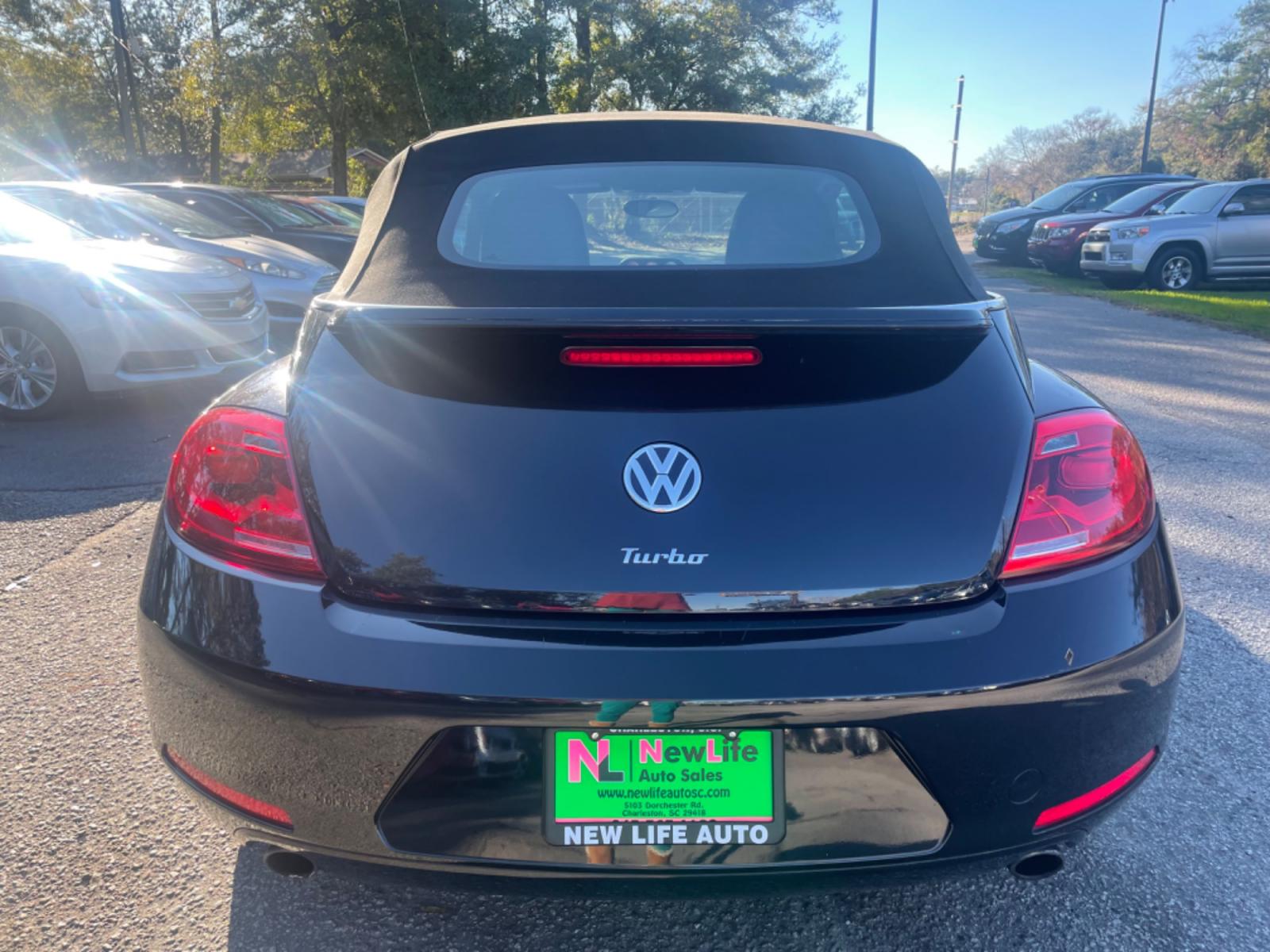 2013 BLACK VOLKSWAGEN BEETLE TURBO (3VW7A7AT2DM) with an 2.0L engine, Automatic transmission, located at 5103 Dorchester Rd., Charleston, SC, 29418-5607, (843) 767-1122, 36.245171, -115.228050 - Leather, Convertible Top, CD/AUX/Bluetooth, Heated Seats, Power Windows, Power Locks, Power Mirrors, All-weather mats, Keyless Entry, Alloy Wheels. Clean CarFax (no accidents reported!) Local Trade-in!! 117k miles Located at New Life Auto Sales! 2018-2022 Top 5 Finalist for Charleston City Paper' - Photo #5