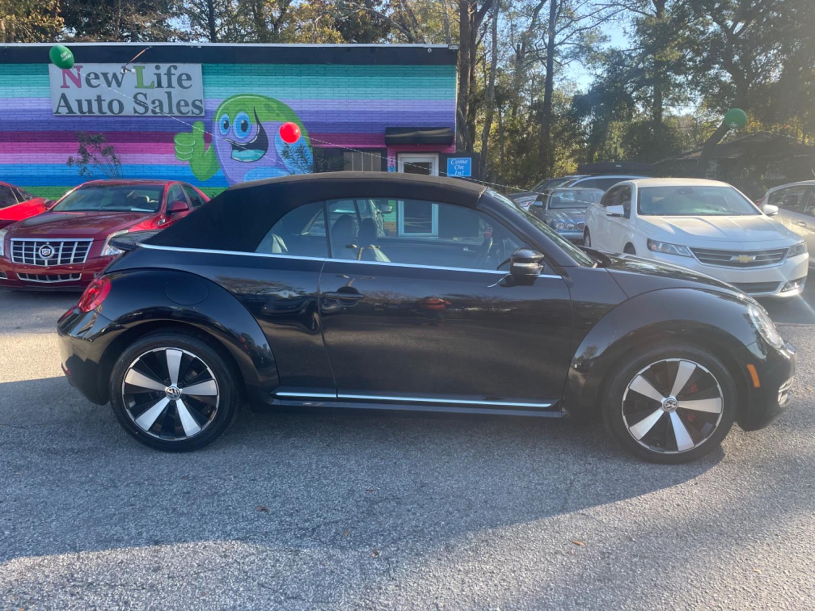 2013 BLACK VOLKSWAGEN BEETLE TURBO (3VW7A7AT2DM) with an 2.0L engine, Automatic transmission, located at 5103 Dorchester Rd., Charleston, SC, 29418-5607, (843) 767-1122, 36.245171, -115.228050 - Leather, Convertible Top, CD/AUX/Bluetooth, Heated Seats, Power Windows, Power Locks, Power Mirrors, All-weather mats, Keyless Entry, Alloy Wheels. Clean CarFax (no accidents reported!) Local Trade-in!! 117k miles Located at New Life Auto Sales! 2018-2022 Top 5 Finalist for Charleston City Paper' - Photo #7