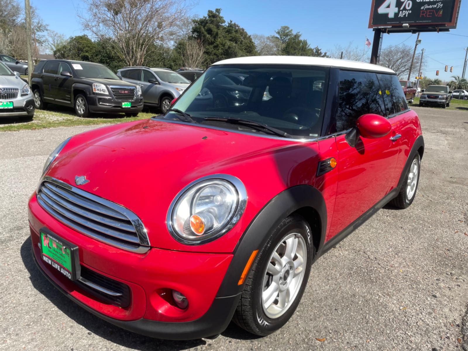 2013 RED MINI COOPER (WMWSU3C53DT) with an 1.6L engine, Manual transmission, located at 5103 Dorchester Rd., Charleston, SC, 29418-5607, (843) 767-1122, 36.245171, -115.228050 - Clean interior with Leather, CD/AUX/Bluetooth, Power Windows, Power Locks, Power Mirrors, Keyless Entry, Push Button Start, Alloy Wheels. Local Trade-in!! ONLY 78k miles Located at New Life Auto Sales! 2018-2023 Top 5 Finalist for Charleston City Paper's BEST PLACE TO BUY A USED CAR! 5103 Dorches - Photo #2
