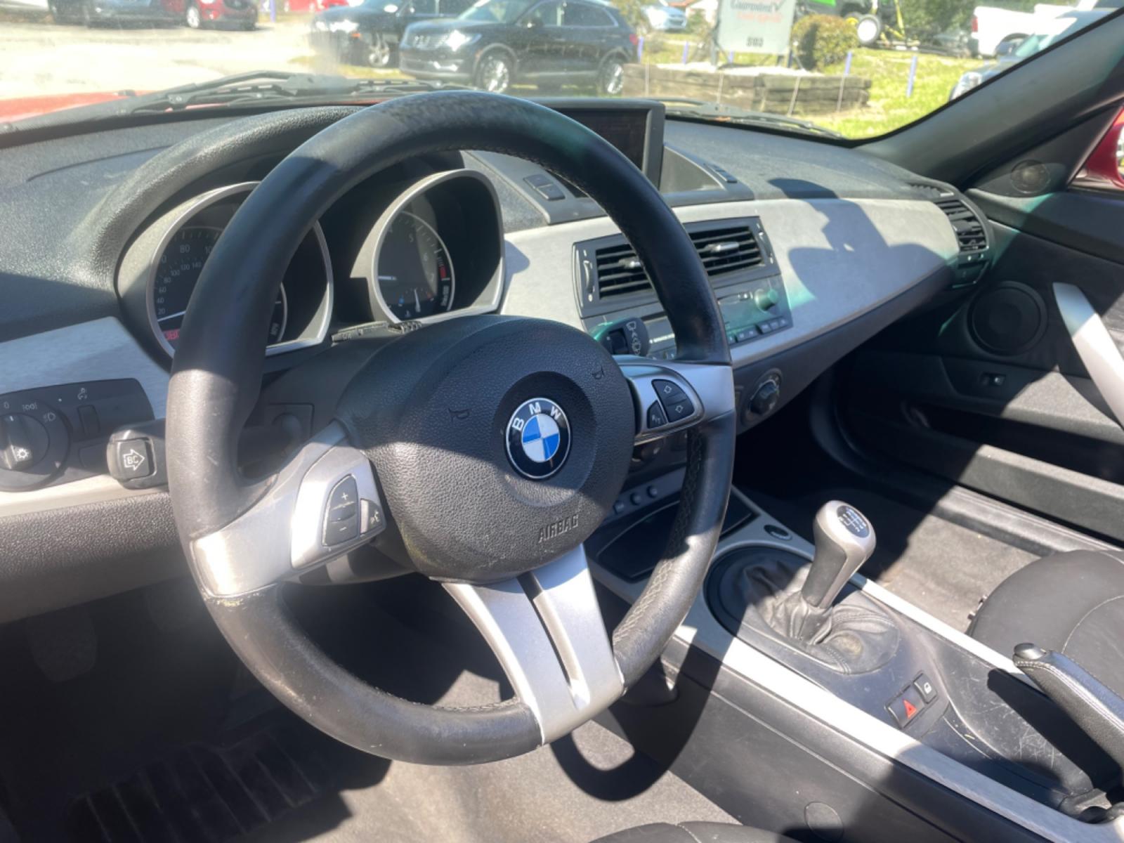 2005 RED BMW Z4 3.0 (4USBT53535L) with an 3.0L engine, 6-Speed Manual transmission, located at 5103 Dorchester Rd., Charleston, SC, 29418-5607, (843) 767-1122, 36.245171, -115.228050 - 6-Speed Manual Transmission!! Beautiful Cherry Red Exterior with Leather Interior, Power Convertible Top, CD/AM/FM, Power Everything (windows, locks, seats, mirrors), Keyless Entry, Alloy Wheels. Only 80k miles!! Located at New Life Auto Sales! 2018-2023 Top 5 Finalist for Charleston City Paper's - Photo #12