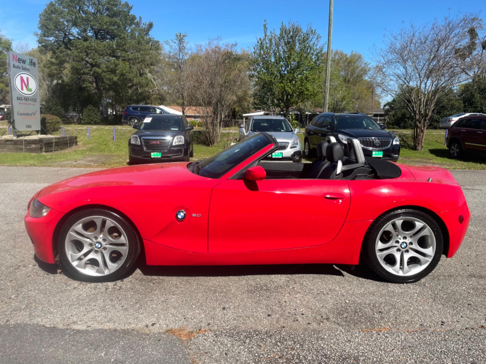 2005 RED BMW Z4 3.0 (4USBT53535L) with an 3.0L engine, 6-Speed Manual transmission, located at 5103 Dorchester Rd., Charleston, SC, 29418-5607, (843) 767-1122, 36.245171, -115.228050 - 6-Speed Manual Transmission!! Beautiful Cherry Red Exterior with Leather Interior, Power Convertible Top, CD/AM/FM, Power Everything (windows, locks, seats, mirrors), Keyless Entry, Alloy Wheels. Only 80k miles!! Located at New Life Auto Sales! 2018-2023 Top 5 Finalist for Charleston City Paper's - Photo #3