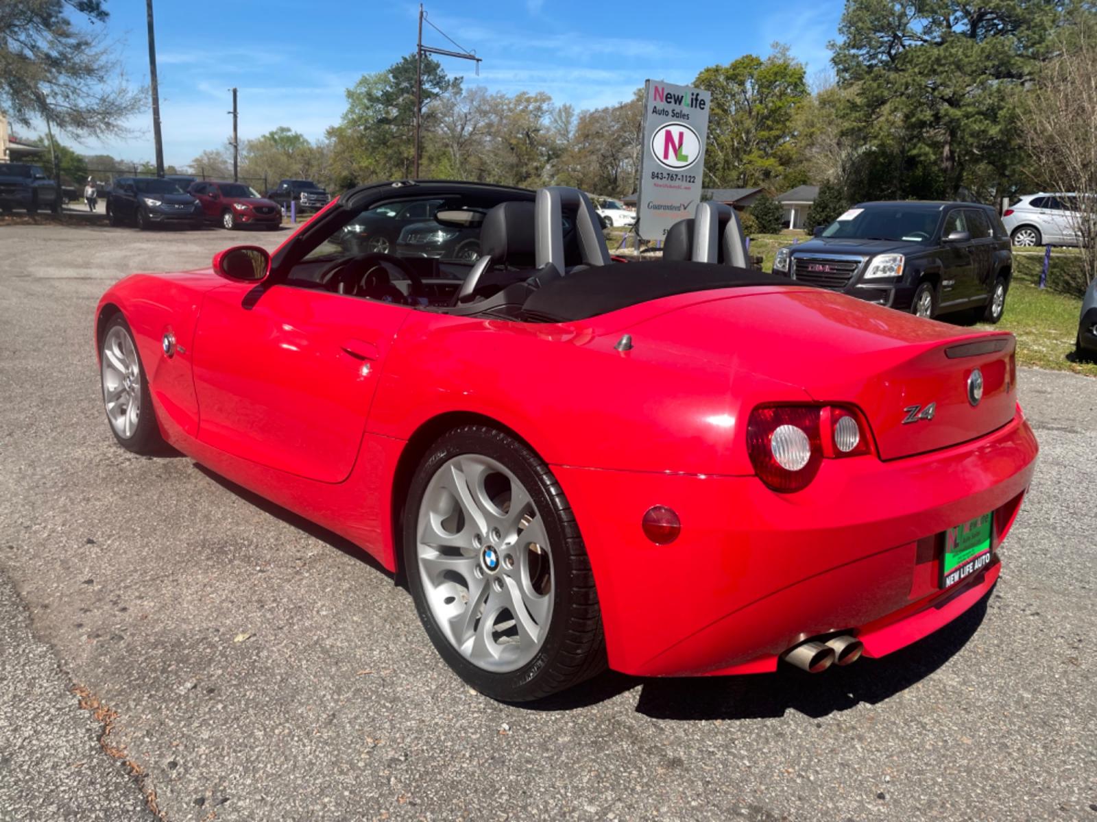 2005 RED BMW Z4 3.0 (4USBT53535L) with an 3.0L engine, 6-Speed Manual transmission, located at 5103 Dorchester Rd., Charleston, SC, 29418-5607, (843) 767-1122, 36.245171, -115.228050 - 6-Speed Manual Transmission!! Beautiful Cherry Red Exterior with Leather Interior, Power Convertible Top, CD/AM/FM, Power Everything (windows, locks, seats, mirrors), Keyless Entry, Alloy Wheels. Only 80k miles!! Located at New Life Auto Sales! 2018-2023 Top 5 Finalist for Charleston City Paper's - Photo #4