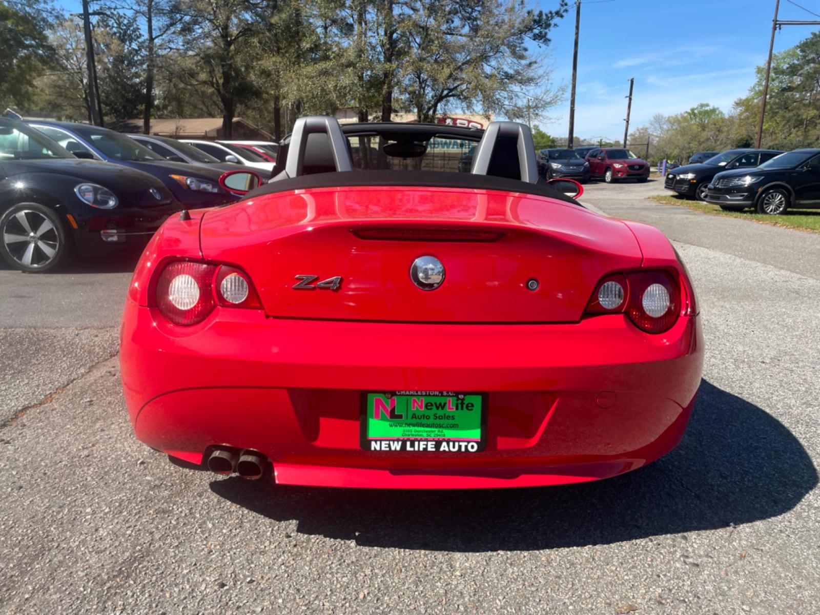 2005 RED BMW Z4 3.0 (4USBT53535L) with an 3.0L engine, 6-Speed Manual transmission, located at 5103 Dorchester Rd., Charleston, SC, 29418-5607, (843) 767-1122, 36.245171, -115.228050 - 6-Speed Manual Transmission!! Beautiful Cherry Red Exterior with Leather Interior, Power Convertible Top, CD/AM/FM, Power Everything (windows, locks, seats, mirrors), Keyless Entry, Alloy Wheels. Only 80k miles!! Located at New Life Auto Sales! 2018-2023 Top 5 Finalist for Charleston City Paper's - Photo #5