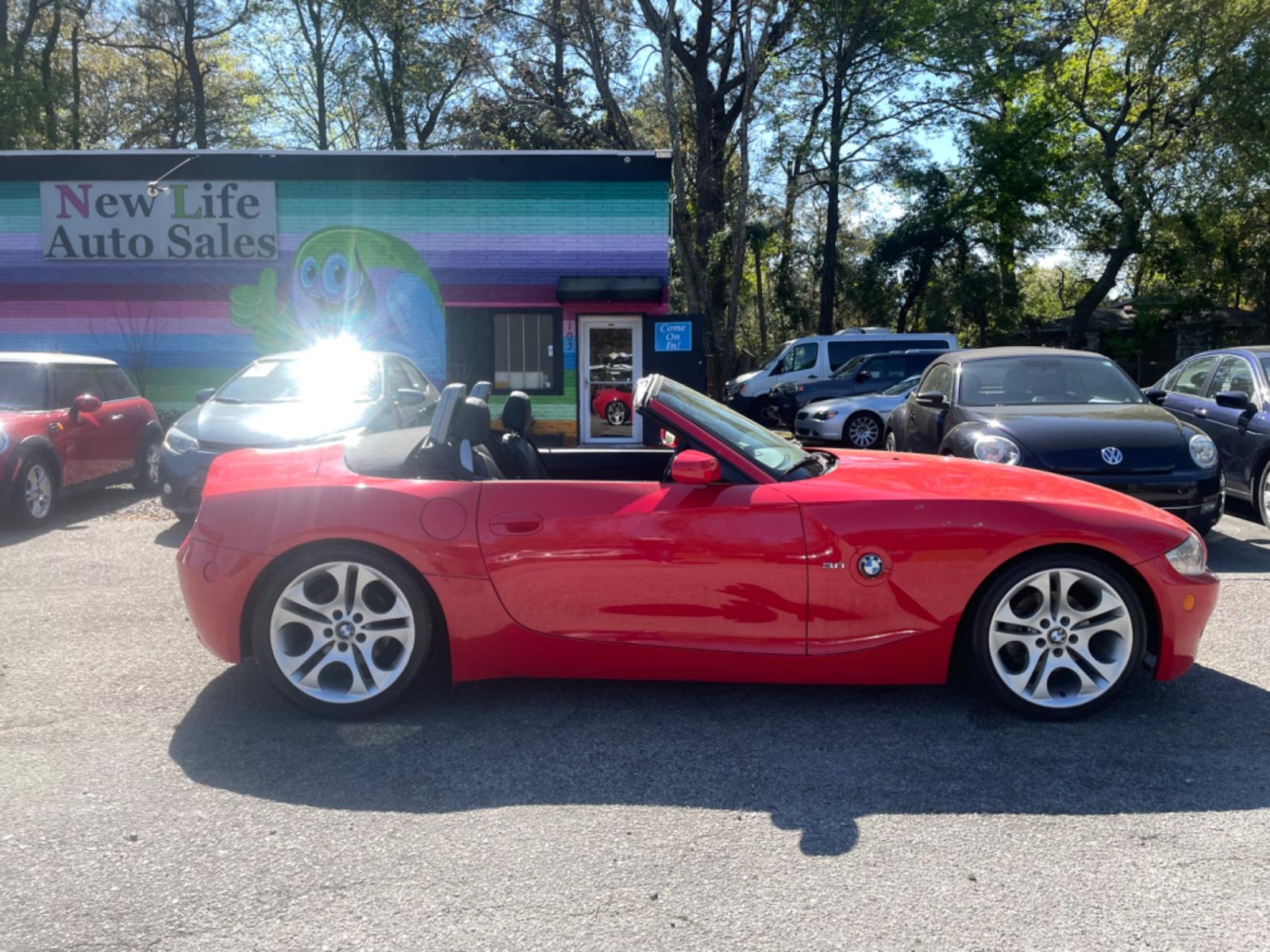 2005 RED BMW Z4 3.0 (4USBT53535L) with an 3.0L engine, 6-Speed Manual transmission, located at 5103 Dorchester Rd., Charleston, SC, 29418-5607, (843) 767-1122, 36.245171, -115.228050 - 6-Speed Manual Transmission!! Beautiful Cherry Red Exterior with Leather Interior, Power Convertible Top, CD/AM/FM, Power Everything (windows, locks, seats, mirrors), Keyless Entry, Alloy Wheels. Only 80k miles!! Located at New Life Auto Sales! 2018-2023 Top 5 Finalist for Charleston City Paper's - Photo #7