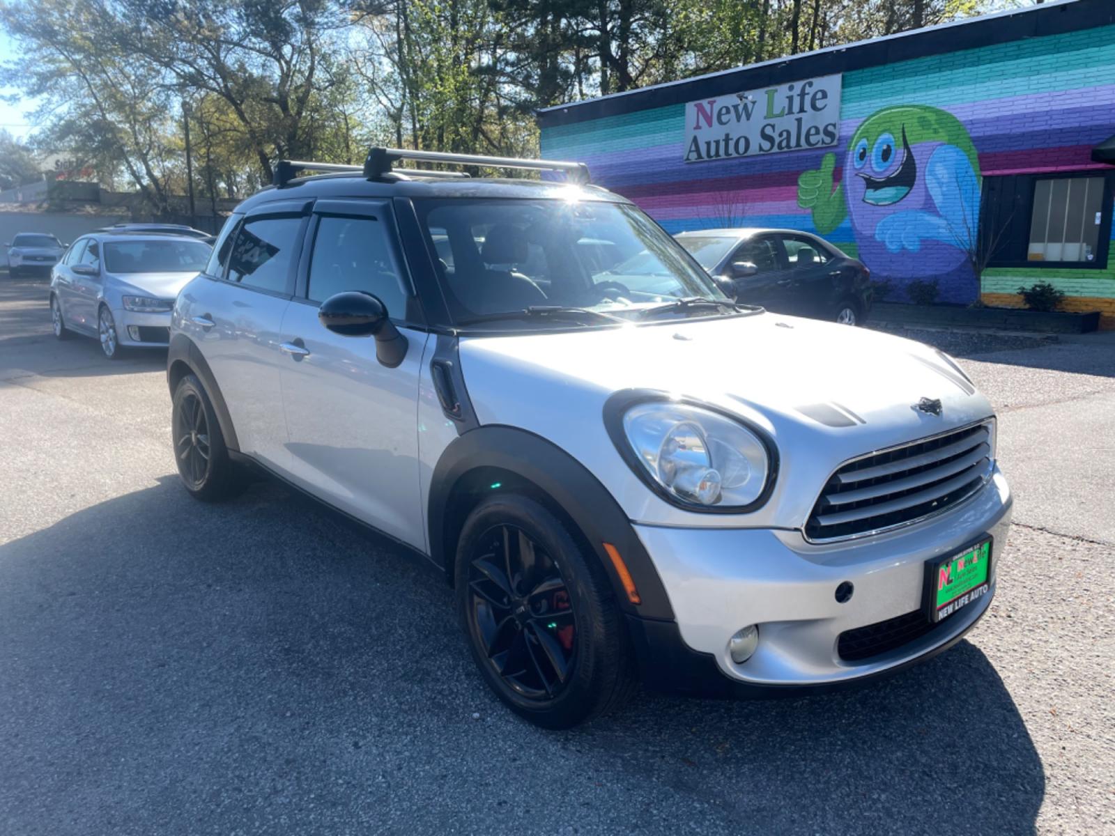 2013 SILVER MINI COOPER COUNTRYMAN (WMWZB3C54DW) with an 1.6L engine, Automatic transmission, located at 5103 Dorchester Rd., Charleston, SC, 29418-5607, (843) 767-1122, 36.245171, -115.228050 - Clean interior with Leather, Double Sunroof, CD/AUX/USB, Handsfree Phone, Power Windows, Power Locks, Power Mirrors, Heated Seats, Keyless Entry, Push Button Start, All-weather Mats, Roof Rack, Alloy Wheels. ONLY 57k miles!! Located at New Life Auto Sales! 2018-2023 Top 5 Finalist for Charleston Ci - Photo #0