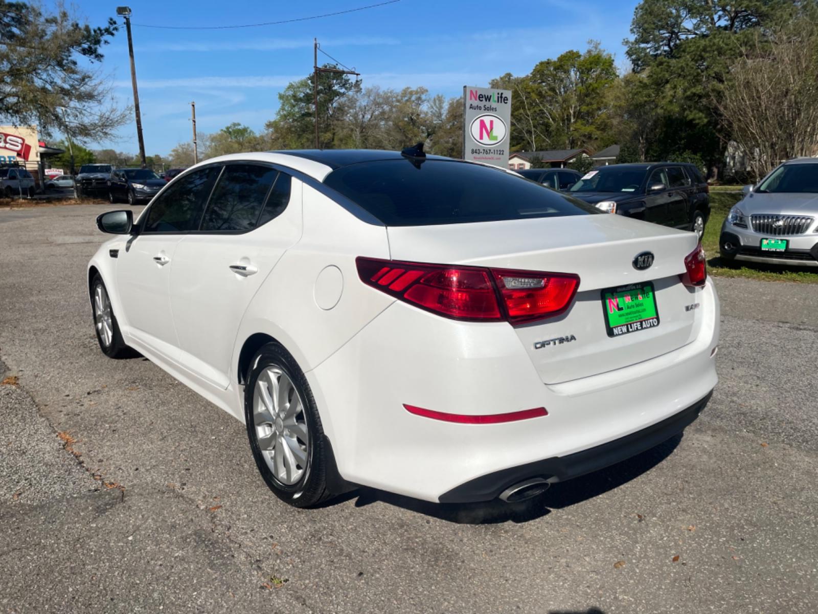 2015 WHITE KIA OPTIMA EX (5XXGN4A79FG) with an 2.4L engine, Automatic transmission, located at 5103 Dorchester Rd., Charleston, SC, 29418-5607, (843) 767-1122, 36.245171, -115.228050 - Clean all around with Leather, Double Sunroof, CD/AUX/Sat/Bluetooth, Handsfree Phone, Backup Camera, Power Everything (windows, locks, seats, mirrros), Heated/Cooled/Memory Seating, Heated Steering Wheel, Dual Climate Control, Push Button Start, Keyless Entry, Alloy Wheels. Local Trade-in!! Only 109 - Photo #4