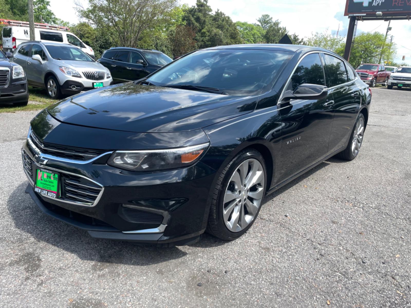 2017 BLACK CHEVROLET MALIBU PREMIER (1G1ZH5SX1HF) with an 2.0L engine, Automatic transmission, located at 5103 Dorchester Rd., Charleston, SC, 29418-5607, (843) 767-1122, 36.245171, -115.228050 - Photo #2