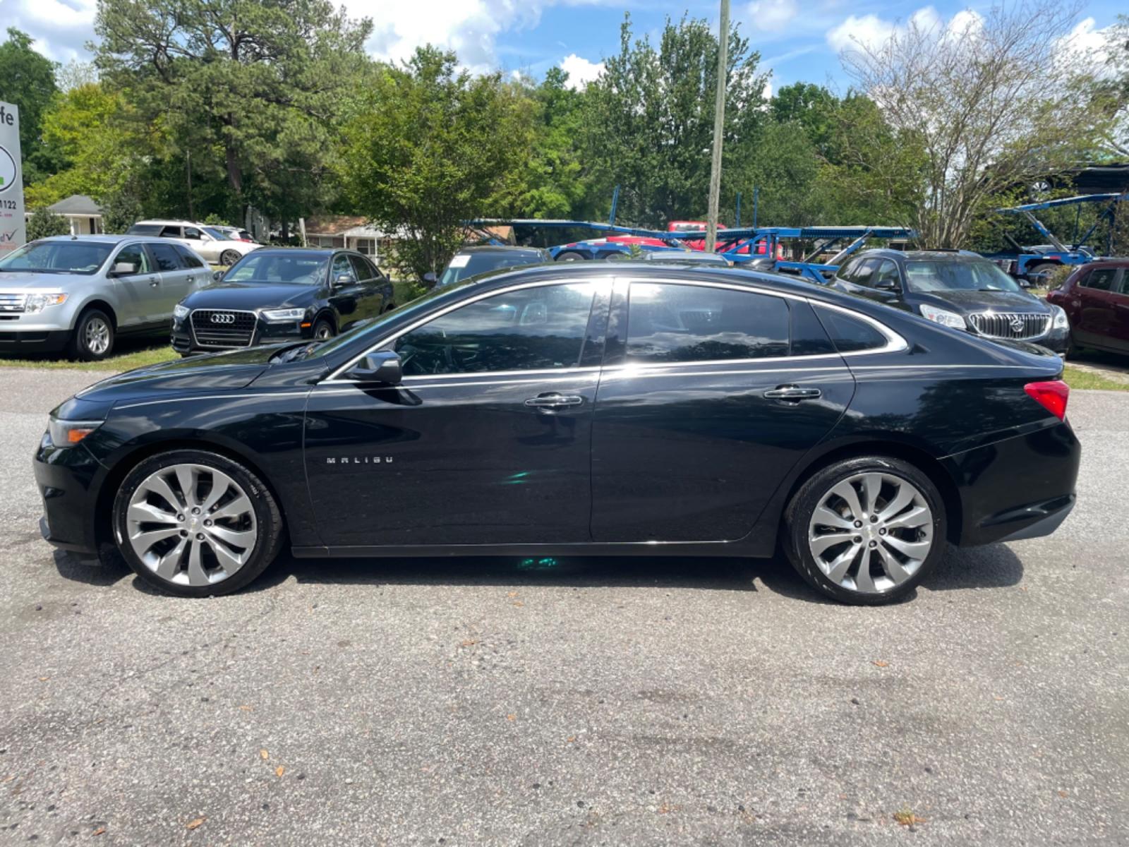 2017 BLACK CHEVROLET MALIBU PREMIER (1G1ZH5SX1HF) with an 2.0L engine, Automatic transmission, located at 5103 Dorchester Rd., Charleston, SC, 29418-5607, (843) 767-1122, 36.245171, -115.228050 - Comfortable & Sleek interior with Leather, Panoramic Sunroof, Navigation, Backup Camera, Bose Sound System with AUX/Bluetooth, Dual Climate Control, Power Everything (windows, locks, seats, mirrors), Heated/Cooled/Memory Seating, Push Button Start, Keyless Entry, Alloy Wheels. Local Trade-in!! 140k - Photo #3