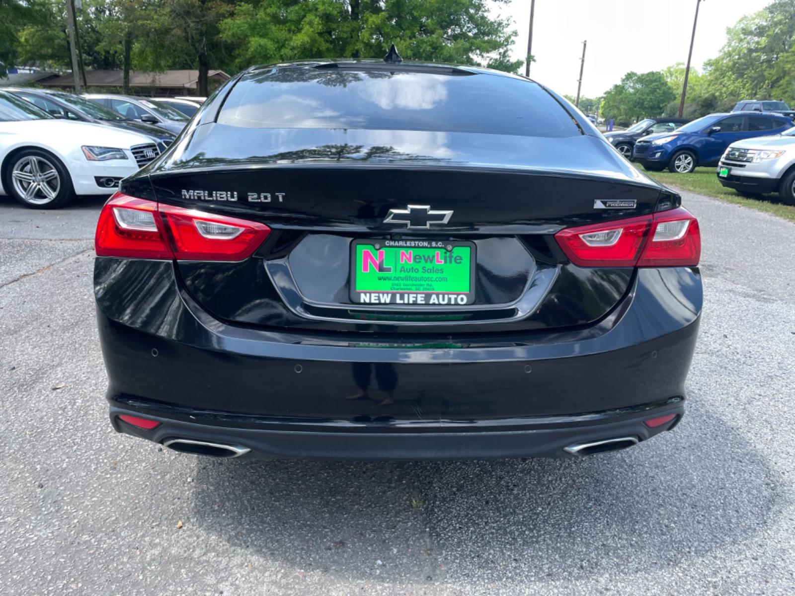 2017 BLACK CHEVROLET MALIBU PREMIER (1G1ZH5SX1HF) with an 2.0L engine, Automatic transmission, located at 5103 Dorchester Rd., Charleston, SC, 29418-5607, (843) 767-1122, 36.245171, -115.228050 - Comfortable & Sleek interior with Leather, Panoramic Sunroof, Navigation, Backup Camera, Bose Sound System with AUX/Bluetooth, Dual Climate Control, Power Everything (windows, locks, seats, mirrors), Heated/Cooled/Memory Seating, Push Button Start, Keyless Entry, Alloy Wheels. Local Trade-in!! 140k - Photo #5