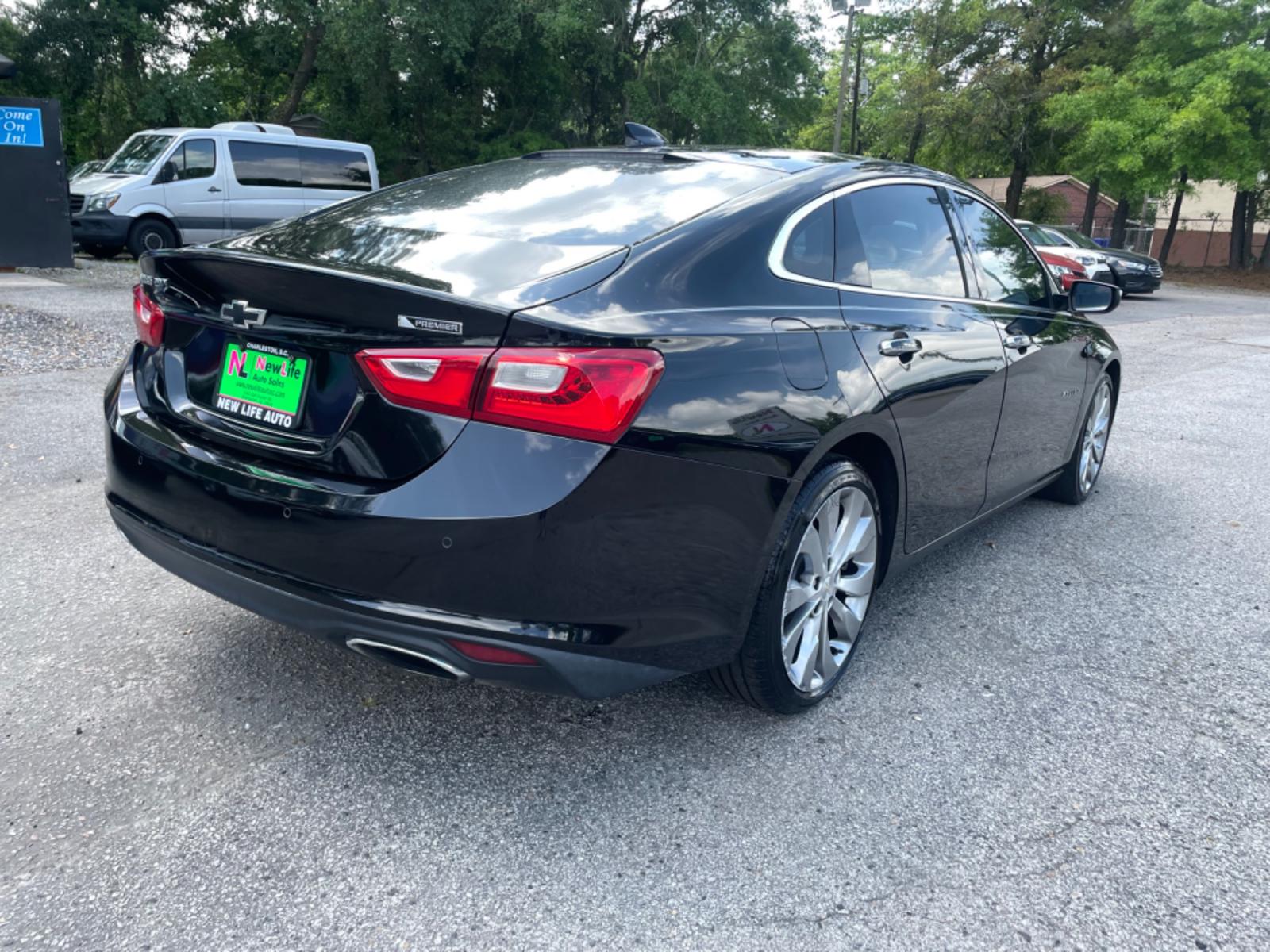 2017 BLACK CHEVROLET MALIBU PREMIER (1G1ZH5SX1HF) with an 2.0L engine, Automatic transmission, located at 5103 Dorchester Rd., Charleston, SC, 29418-5607, (843) 767-1122, 36.245171, -115.228050 - Comfortable & Sleek interior with Leather, Panoramic Sunroof, Navigation, Backup Camera, Bose Sound System with AUX/Bluetooth, Dual Climate Control, Power Everything (windows, locks, seats, mirrors), Heated/Cooled/Memory Seating, Push Button Start, Keyless Entry, Alloy Wheels. Local Trade-in!! 140k - Photo #6