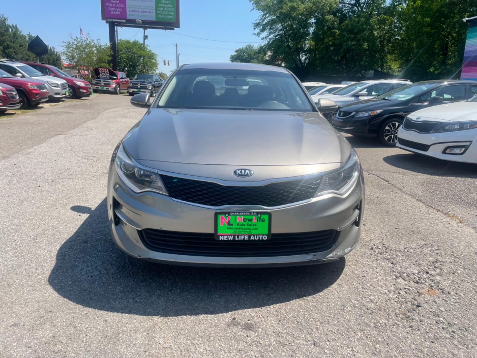 2016 GRAY KIA OPTIMA LX (5XXGT4L32GG) with an 2.4L engine, Automatic transmission, located at 5103 Dorchester Rd., Charleston, SC, 29418-5607, (843) 767-1122, 36.245171, -115.228050 - Photo #1
