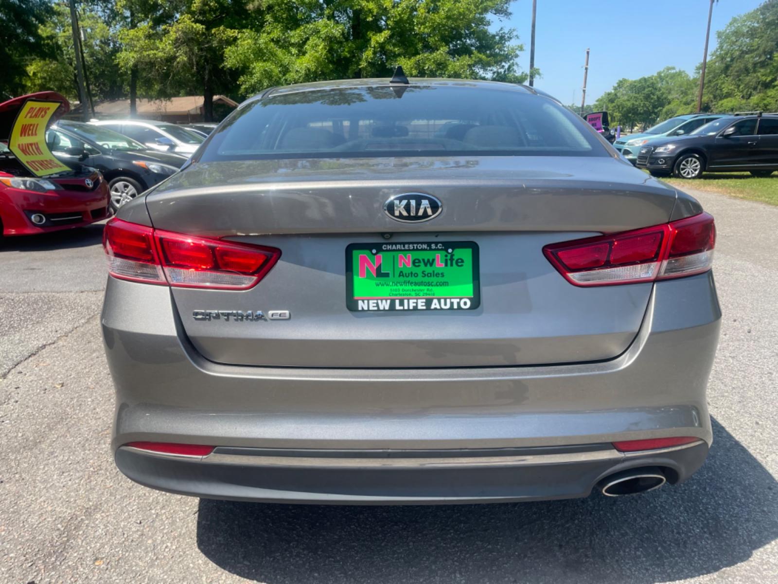 2016 GRAY KIA OPTIMA LX (5XXGT4L32GG) with an 2.4L engine, Automatic transmission, located at 5103 Dorchester Rd., Charleston, SC, 29418-5607, (843) 767-1122, 36.245171, -115.228050 - Local Trade-in with CD/AUX/Sat/Bluetooth, Power Windows, Power Locks, Power Mirrors, Backup Camera, Keyless Entry, Alloy Wheels. Clean CarFax (no accidents reported!) 128k miles Located at New Life Auto Sales! 2018-2023 Top 5 Finalist for Charleston City Paper's BEST PLACE TO BUY A USED CAR! 5103 D - Photo #6