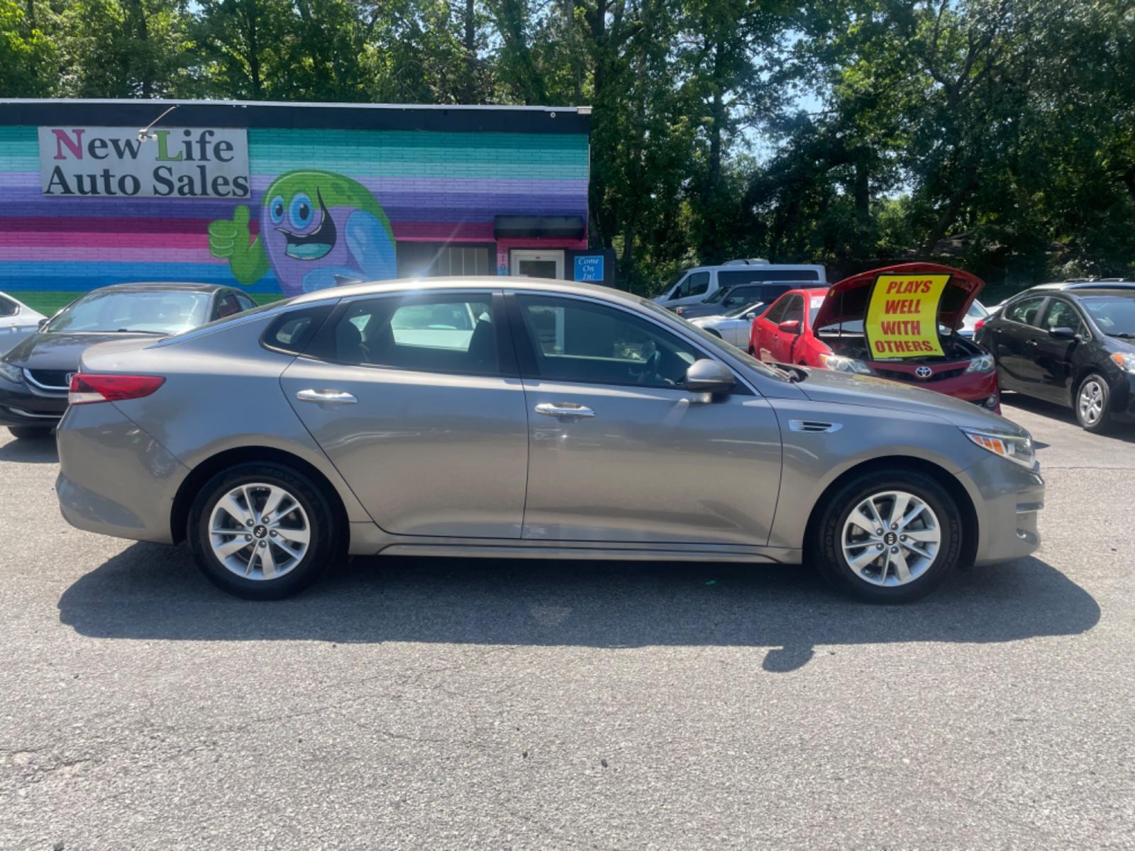 2016 GRAY KIA OPTIMA LX (5XXGT4L32GG) with an 2.4L engine, Automatic transmission, located at 5103 Dorchester Rd., Charleston, SC, 29418-5607, (843) 767-1122, 36.245171, -115.228050 - Local Trade-in with CD/AUX/Sat/Bluetooth, Power Windows, Power Locks, Power Mirrors, Backup Camera, Keyless Entry, Alloy Wheels. Clean CarFax (no accidents reported!) 128k miles Located at New Life Auto Sales! 2018-2023 Top 5 Finalist for Charleston City Paper's BEST PLACE TO BUY A USED CAR! 5103 D - Photo #7