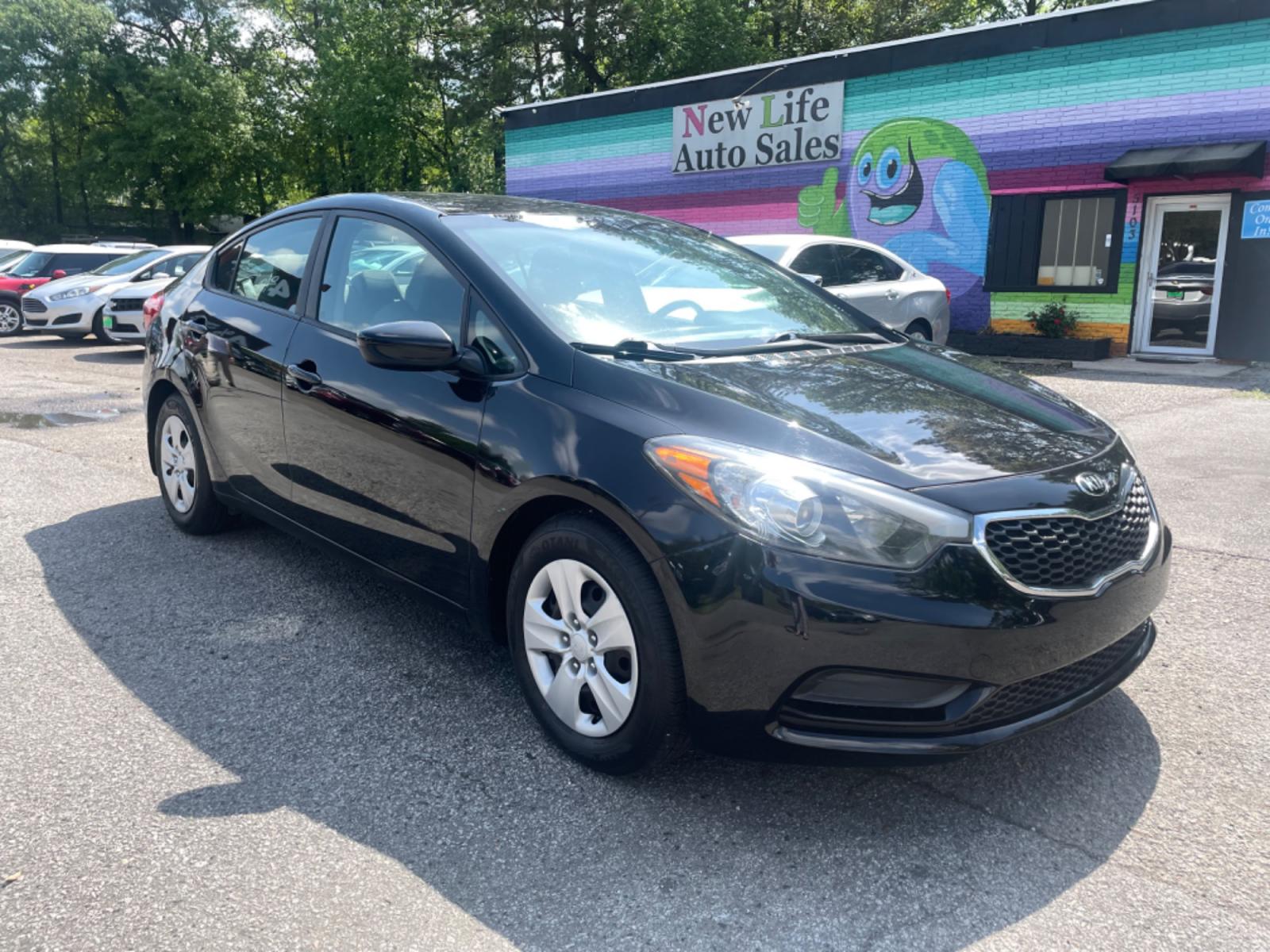 2015 BLACK KIA FORTE LX (KNAFK4A63F5) with an 1.8L engine, Automatic transmission, located at 5103 Dorchester Rd., Charleston, SC, 29418-5607, (843) 767-1122, 36.245171, -115.228050 - Clean interior with CD/AUX/USB/Sat/Bluetooth, Power Windows, Power Locks, Power Mirrors, Keyless Entry. Clean CarFax (no accidents reported!) 121k miles Located at New Life Auto Sales! 2018-2023 Top 5 Finalist for Charleston City Paper's BEST PLACE TO BUY A USED CAR! 5103 Dorchester Road, North Cha - Photo #0