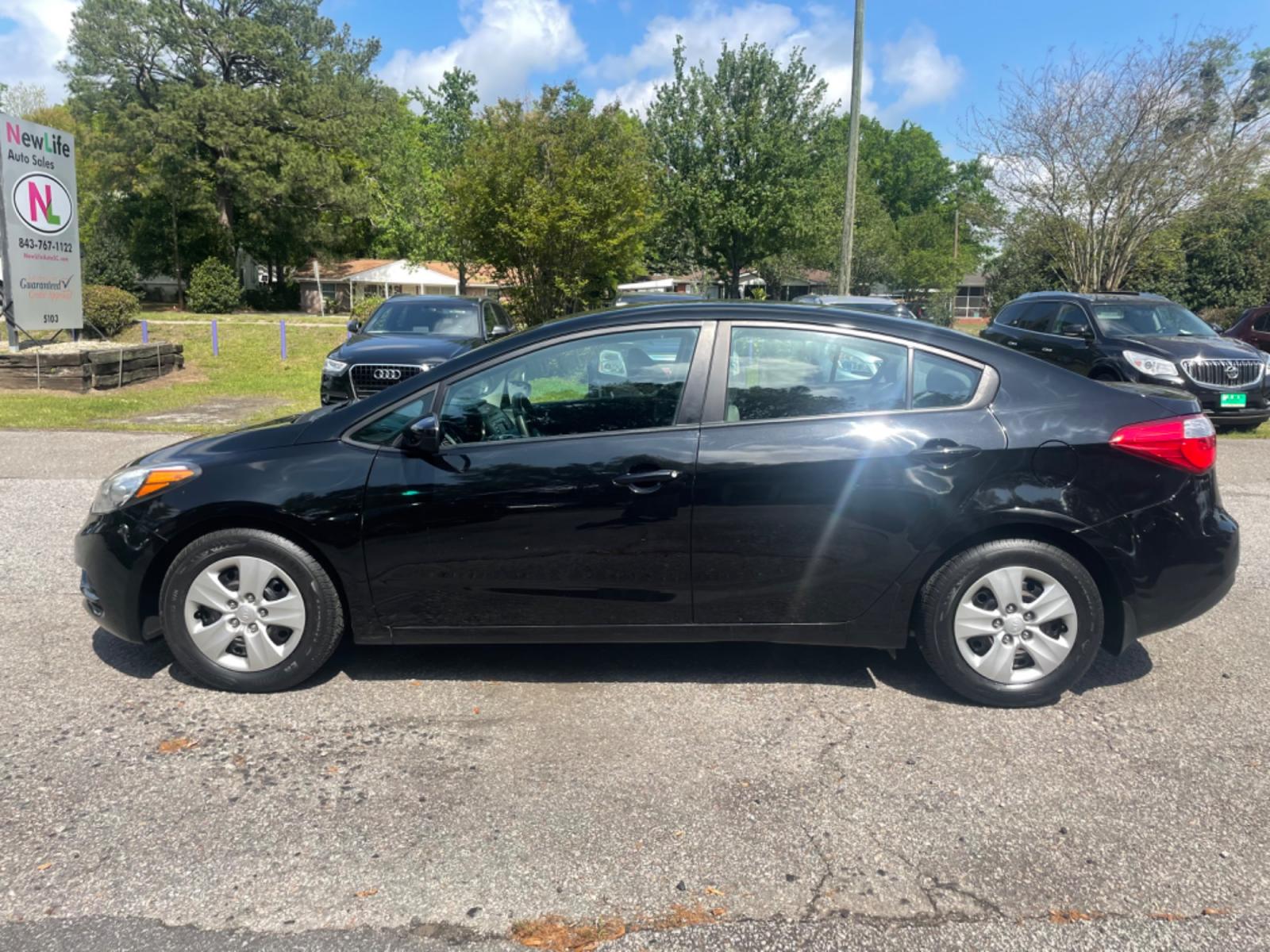 2015 BLACK KIA FORTE LX (KNAFK4A63F5) with an 1.8L engine, Automatic transmission, located at 5103 Dorchester Rd., Charleston, SC, 29418-5607, (843) 767-1122, 36.245171, -115.228050 - Photo #3