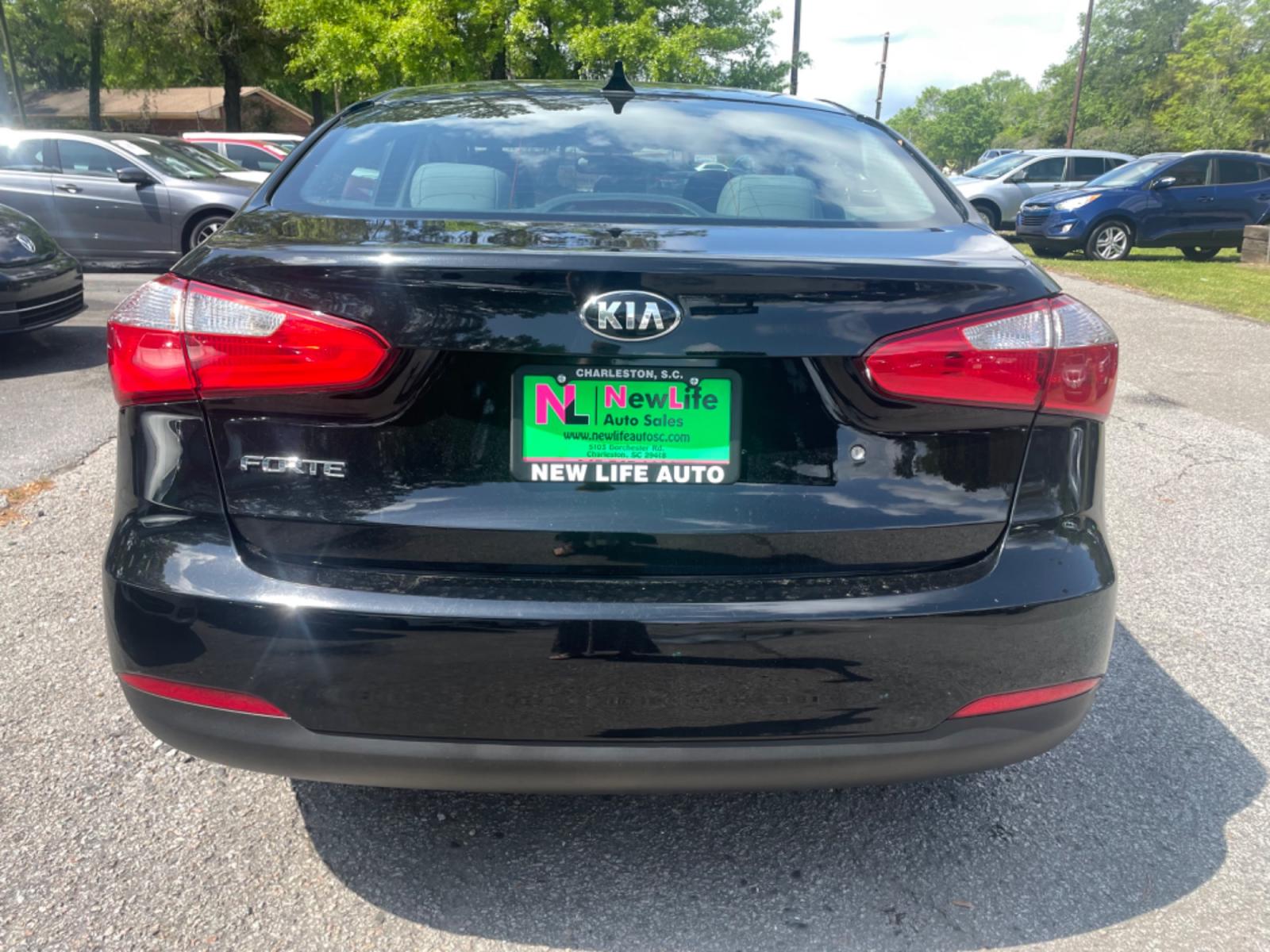 2015 BLACK KIA FORTE LX (KNAFK4A63F5) with an 1.8L engine, Automatic transmission, located at 5103 Dorchester Rd., Charleston, SC, 29418-5607, (843) 767-1122, 36.245171, -115.228050 - Clean interior with CD/AUX/USB/Sat/Bluetooth, Power Windows, Power Locks, Power Mirrors, Keyless Entry. Clean CarFax (no accidents reported!) 121k miles Located at New Life Auto Sales! 2018-2023 Top 5 Finalist for Charleston City Paper's BEST PLACE TO BUY A USED CAR! 5103 Dorchester Road, North Cha - Photo #6