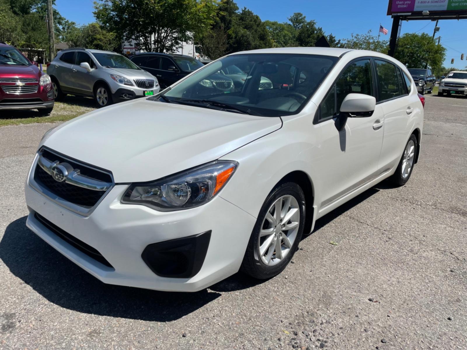 2012 WHITE SUBARU IMPREZA PREMIUM (JF1GPAB67CH) with an 2.0L engine, Continuously Variable transmission, located at 5103 Dorchester Rd., Charleston, SC, 29418-5607, (843) 767-1122, 36.245171, -115.228050 - Photo #2