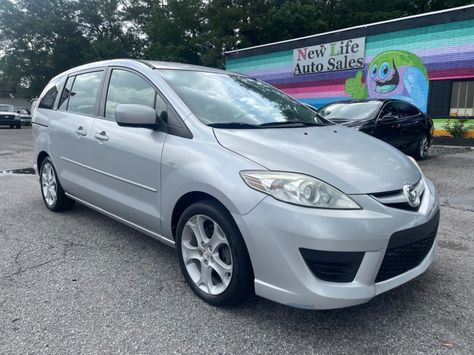2008 SILVER MAZDA 5 (JM1CR293680) with an 2.3L engine, Automatic transmission, located at 5103 Dorchester Rd., Charleston, SC, 29418-5607, (843) 767-1122, 36.245171, -115.228050 - Blends the best qualities of wagons and minivans, including sliding rear doors! Clean Interior with 6-Disc CD/AUX/Sat, Power Windows, Power Locks, Power Mirrors, Third Row, Middle Captains Seats, Keyless Entry, Alloy Wheels. Clean Carfax (no accidents reported!) Local Trade-in!! Located at New Life - Photo #0