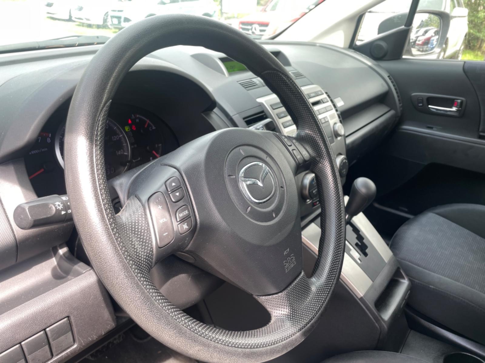 2008 SILVER MAZDA 5 (JM1CR293680) with an 2.3L engine, Automatic transmission, located at 5103 Dorchester Rd., Charleston, SC, 29418-5607, (843) 767-1122, 36.245171, -115.228050 - Blends the best qualities of wagons and minivans, including sliding rear doors! Clean Interior with 6-Disc CD/AUX/Sat, Power Windows, Power Locks, Power Mirrors, Third Row, Middle Captains Seats, Keyless Entry, Alloy Wheels. Clean Carfax (no accidents reported!) Local Trade-in!! Located at New Life - Photo #20