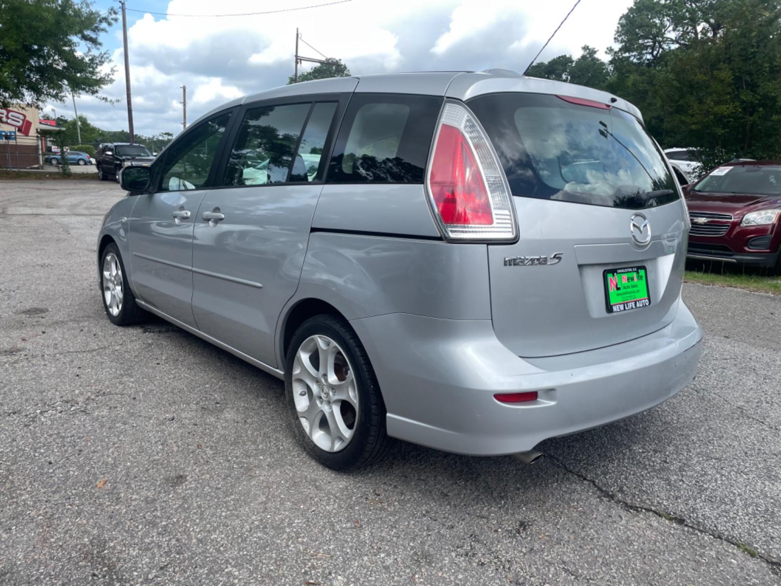 2008 SILVER MAZDA 5 (JM1CR293680) with an 2.3L engine, Automatic transmission, located at 5103 Dorchester Rd., Charleston, SC, 29418-5607, (843) 767-1122, 36.245171, -115.228050 - Blends the best qualities of wagons and minivans, including sliding rear doors! Clean Interior with 6-Disc CD/AUX/Sat, Power Windows, Power Locks, Power Mirrors, Third Row, Middle Captains Seats, Keyless Entry, Alloy Wheels. Clean Carfax (no accidents reported!) Local Trade-in!! Located at New Life - Photo #5