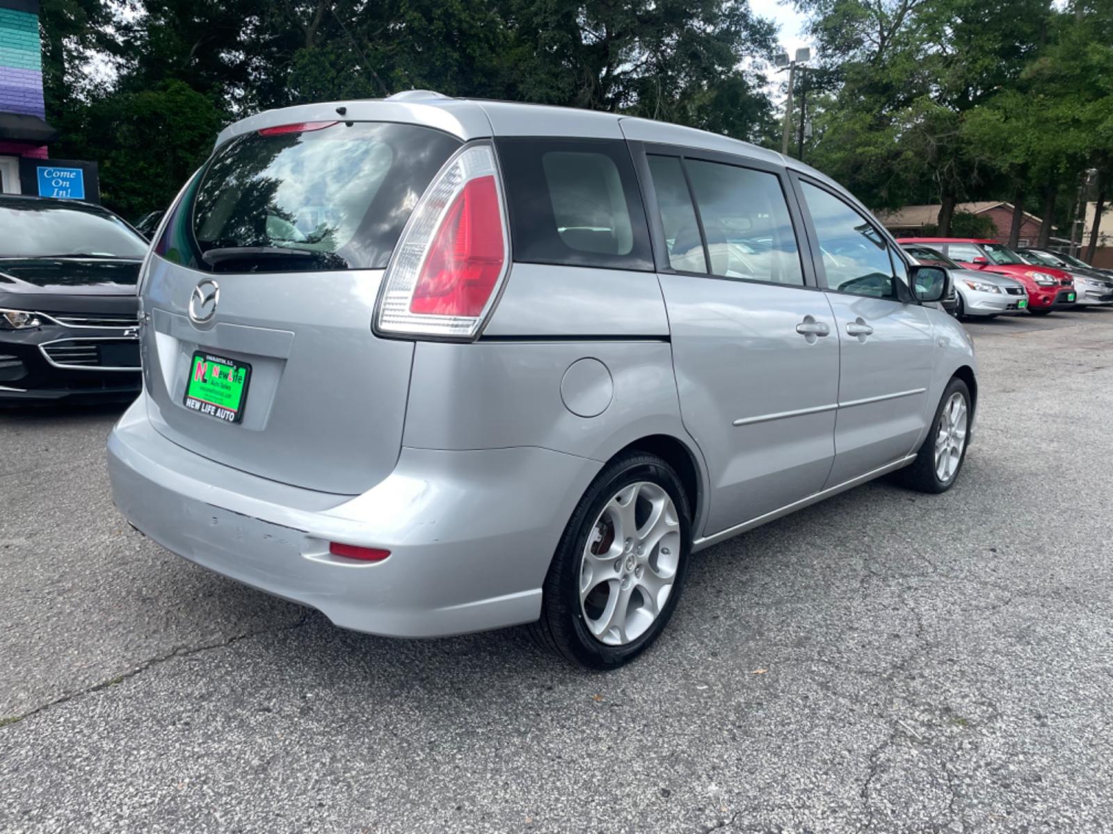 2008 SILVER MAZDA 5 (JM1CR293680) with an 2.3L engine, Automatic transmission, located at 5103 Dorchester Rd., Charleston, SC, 29418-5607, (843) 767-1122, 36.245171, -115.228050 - Blends the best qualities of wagons and minivans, including sliding rear doors! Clean Interior with 6-Disc CD/AUX/Sat, Power Windows, Power Locks, Power Mirrors, Third Row, Middle Captains Seats, Keyless Entry, Alloy Wheels. Clean Carfax (no accidents reported!) Local Trade-in!! Located at New Life - Photo #6