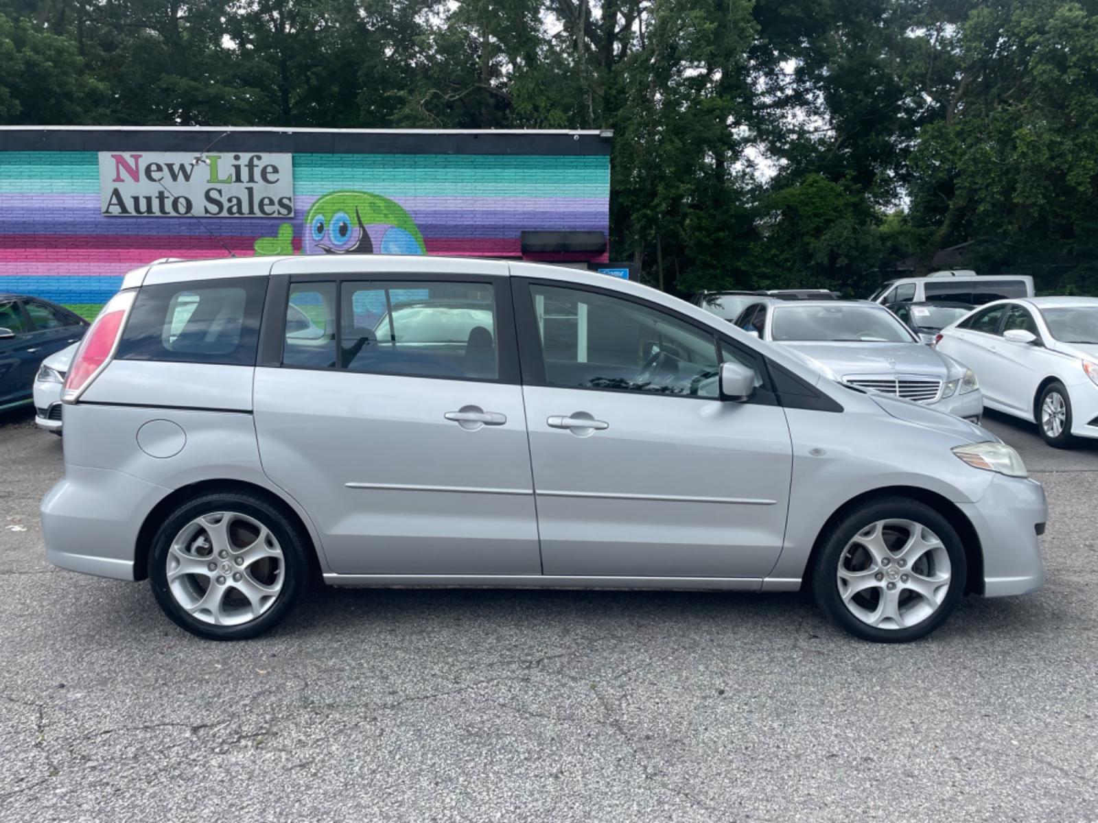 2008 SILVER MAZDA 5 (JM1CR293680) with an 2.3L engine, Automatic transmission, located at 5103 Dorchester Rd., Charleston, SC, 29418-5607, (843) 767-1122, 36.245171, -115.228050 - Blends the best qualities of wagons and minivans, including sliding rear doors! Clean Interior with 6-Disc CD/AUX/Sat, Power Windows, Power Locks, Power Mirrors, Third Row, Middle Captains Seats, Keyless Entry, Alloy Wheels. Clean Carfax (no accidents reported!) Local Trade-in!! Located at New Life - Photo #7