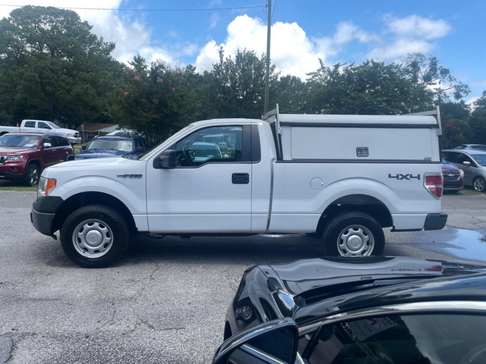2014 WHITE FORD F150 XL (1FTMF1EM5EF) with an 3.7L engine, Automatic transmission, located at 5103 Dorchester Rd., Charleston, SC, 29418-5607, (843) 767-1122, 36.245171, -115.228050 - Clean CarFax (no accidents reported!) Basic and super clean vinyl interior with cold A/C, AM/FM Radio, Heavy Duty Utility Shell with Storage Galore. Certified One Owner!! 254k miles Located at New Life Auto Sales! 2018-2023 Top 5 Finalist for Charleston City Paper's BEST PLACE TO BUY A USED CAR! 51 - Photo #3